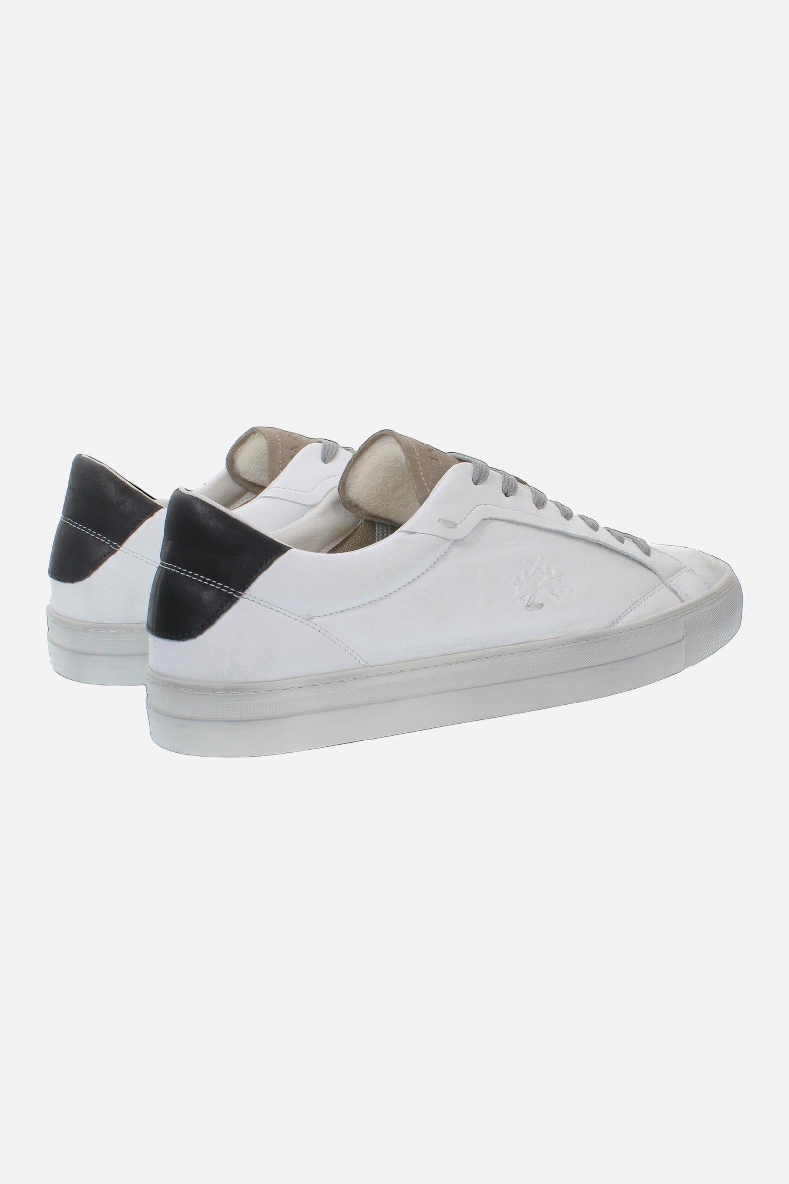 Leather sneaker blending vintage and modern style, with flexible divided tongue, nubuck heel, hand-stitched details, and a lightweight, comfortable off-white sole. - Optic White