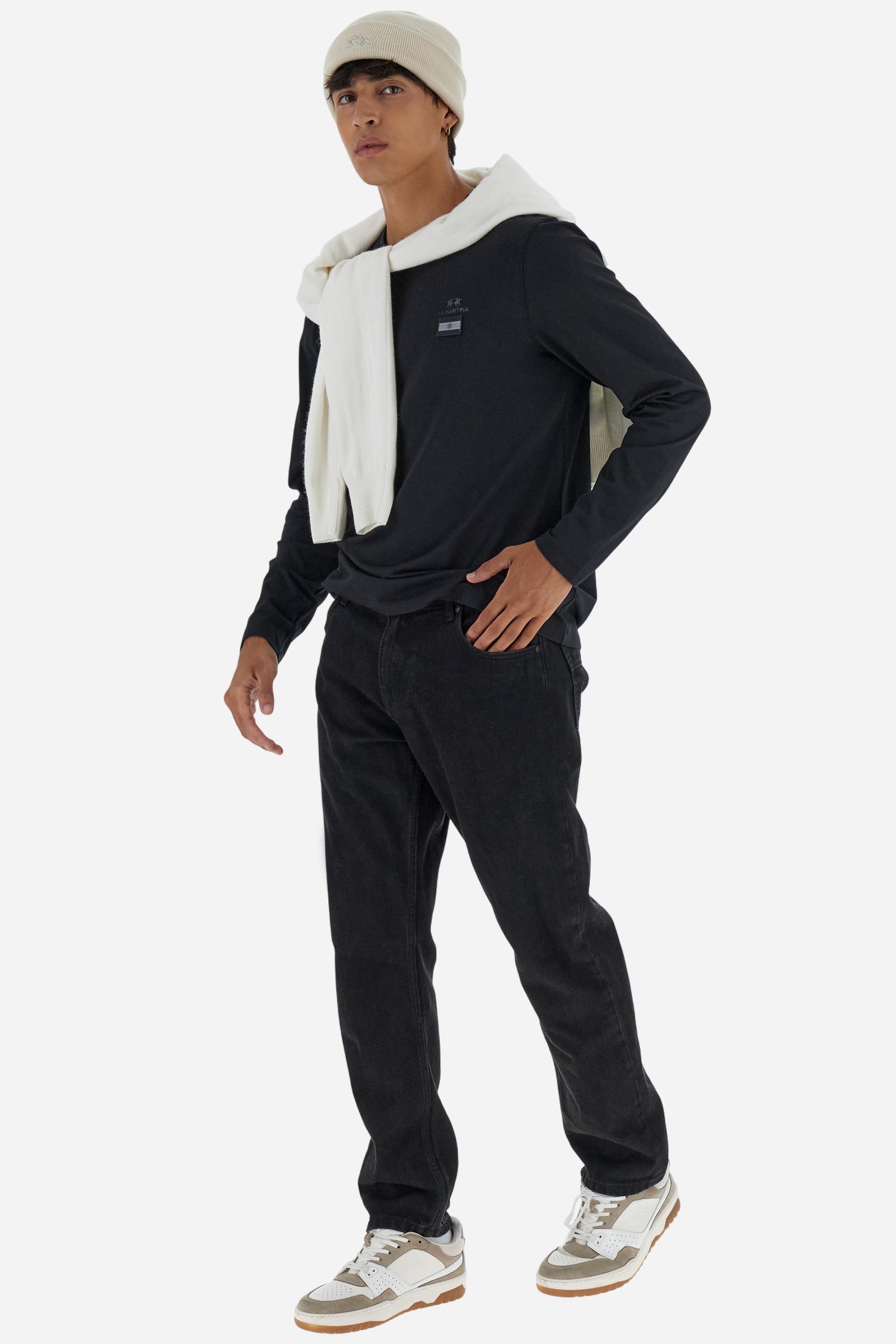 Crew-neck long-sleeve T-shirt made of 100% high-quality cotton jersey. The smooth, fluid fabric has a technical look that ensures comfort and style. A small translucent transfer logo is applied on the chest, while two Asociacion Argentina de Polo (AAP) transfers decorate the right sleeve. The large vertical translucent print on the back is a signature detail of the brand. Regular fit with clean lines and refined finishes for a simple yet distinctive piece. Model wears size L. - Black