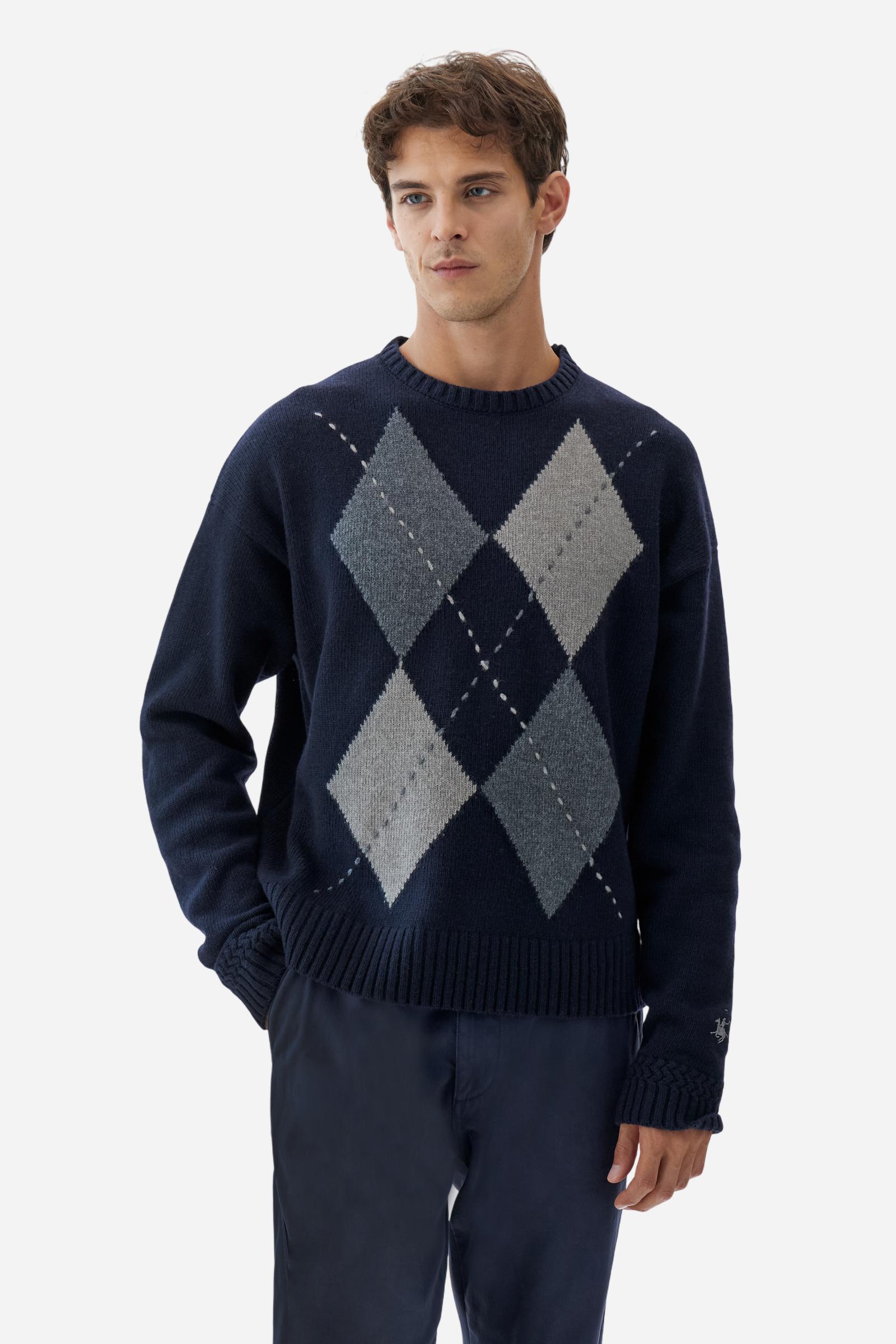 Men’s crew-neck sweater with long sleeves in high-quality wool blend. Ribbed collar, cuffs and hem with zigzag detail at sleeve attachment. Argyle motif on the front and contrast embroidered logo on the cuff. Regular fit with dropped shoulders for a contemporary look. The model wears size L. - Navy