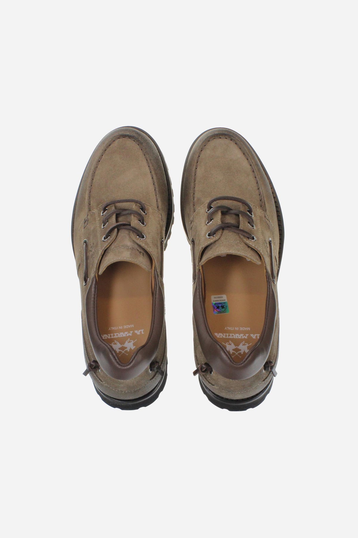 Men's suede boat shoe with handcrafted moccasin stitching, padded nappa leather collar, leather laces, and Vibram® sole for lightweight cushioning and grip. Made in Italy. - Taupe Gray