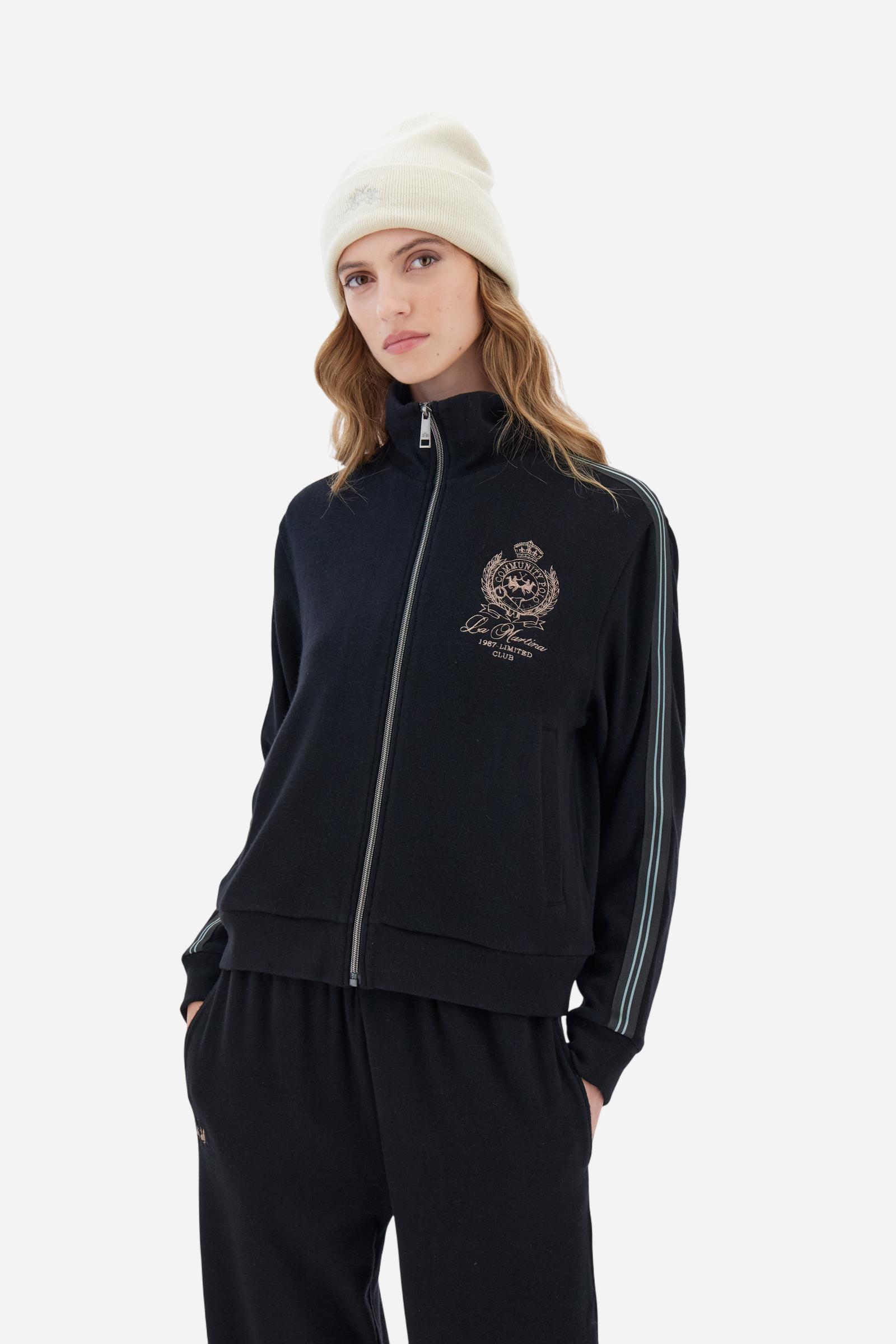 Women’s full-zip sweatshirt with long sleeves in soft interlock viscose blend, offering a luxurious feel on the skin. Straight cut with fluid line and sport-luxury details. Striped bands on the sleeves and heraldic embroidery on the chest add a contemporary touch. The model wears size 2. - Black