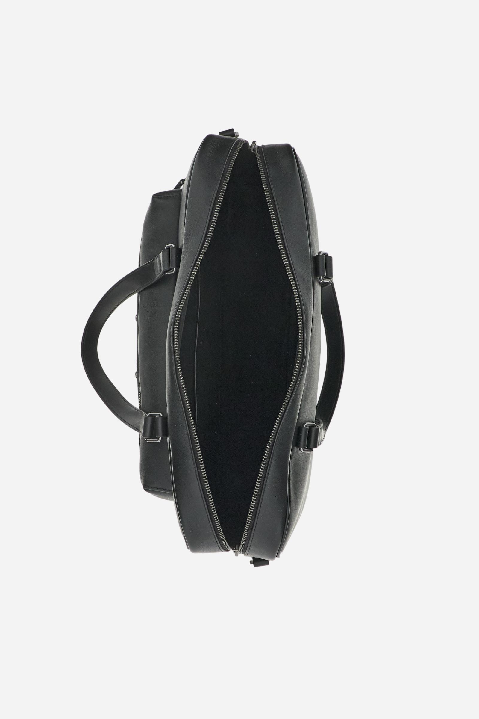 Work bag in calfskin leather with urban character, made of smooth and natural leather. Structured and spacious, with a practical front zip pocket and refined metallic details that enhance its elegance. Dimensions:41 x 30 x 8.5 - Black