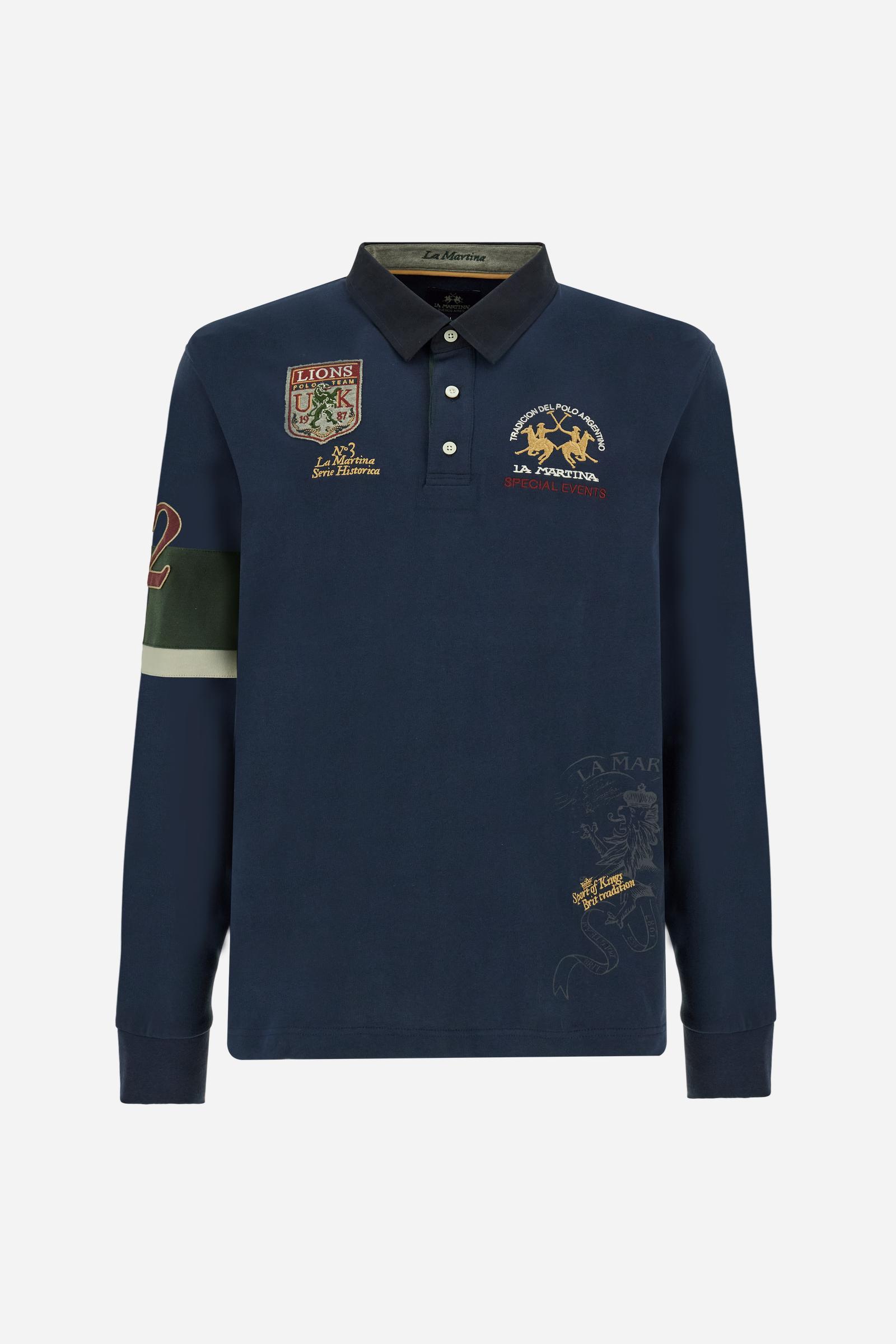 Long-sleeve polo shirt in 100% cotton jersey, soft and warm to the touch. Gabardine collar in tone with a contrast placket for a modern look. The English flag is printed under the raised right collar tip. Contrasting fabric bands and a patch with number 2 decorate the right sleeve, evoking polo player uniforms. Multicolor graphics dedicated to the English team and past special events enrich the design, with a large team logo embroidered in two-tone on the chest. Regular fit. Model wears size L. - Navy