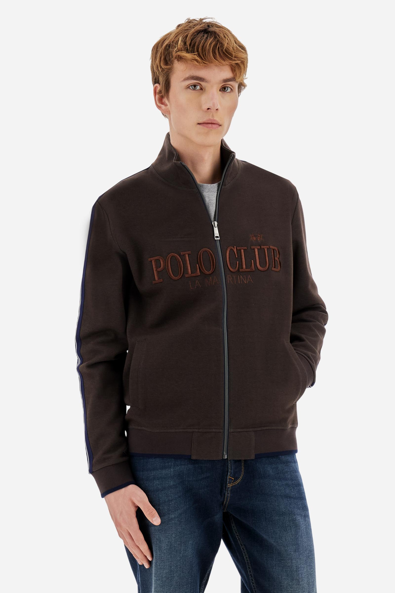 Men's long-sleeved, full-zip sweatshirt. Made of soft solid colour cotton fleece. The neck and cuffs and waistband are in solid colour ribbed knit with contrasting edging. Front zip opening and Polo club guarantee label applied to the edge inside the collar. The front lettering is a large tone-on-tone raised embroidery. A narrow two-tone striped band is applied to the shoulders and sleeves. Regular fit. The model is wearing a size L. - Java