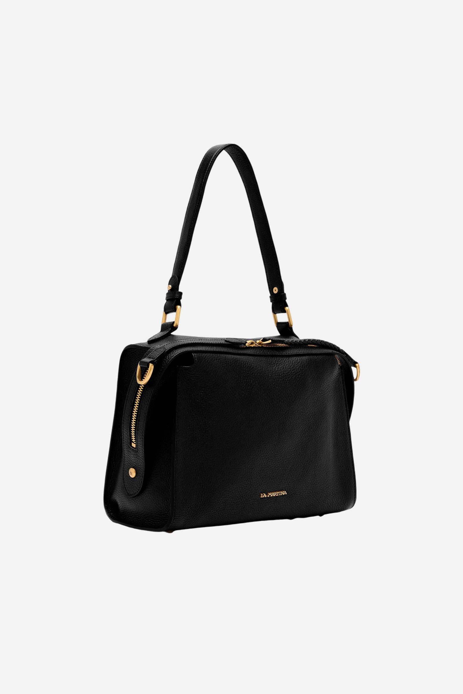 Compact full-grain leather shoulder bag with long handles and side zip pullers for a distinctive, modern design. - Black