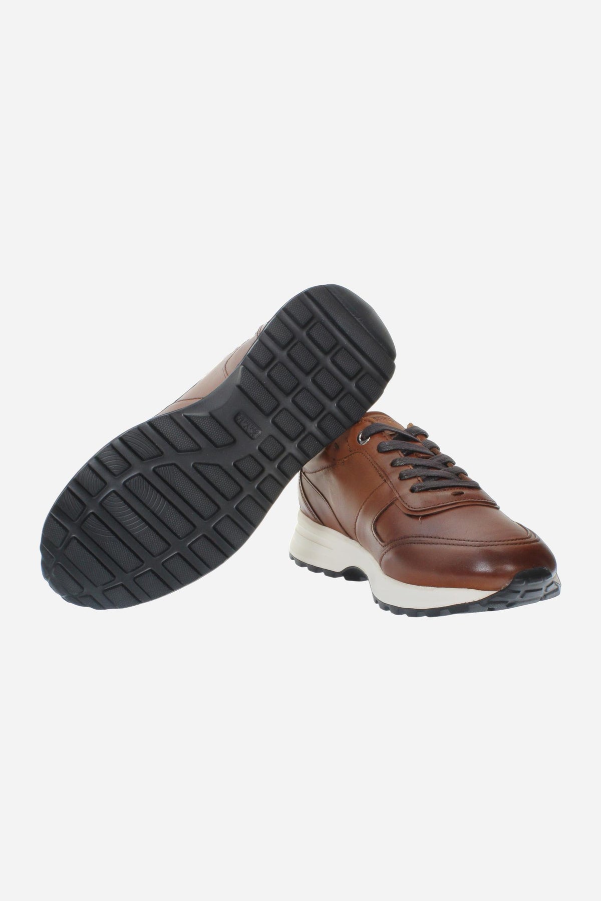 Men's leather sneaker with tone-on-tone stitching, hand-stitched details, embossed logos, and a lightweight two-tone EVA sole for comfort and grip. - COGNAC