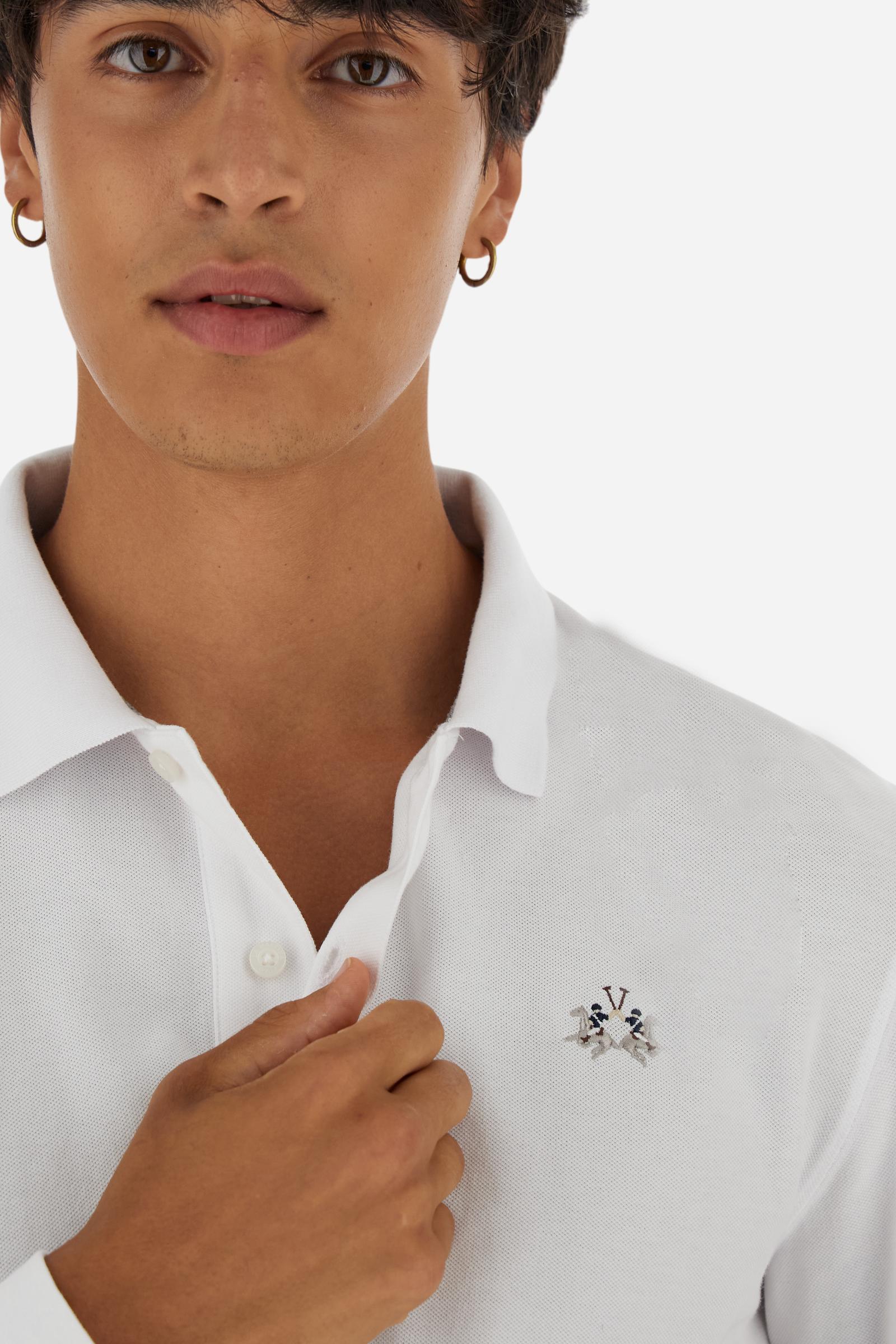 Men’s long-sleeve polo in high-quality stretch cotton piqué for comfort and flexibility. Tone-on-tone ribbed collar with contrast gabardine undercollar embroidered with the brand’s iconic lettering, revealed when the collar is lifted. Contrast embroidered logo on the chest. Slim fit, offering a modern silhouette that enhances the body while ensuring freedom of movement. Model wears size L. - Optic White