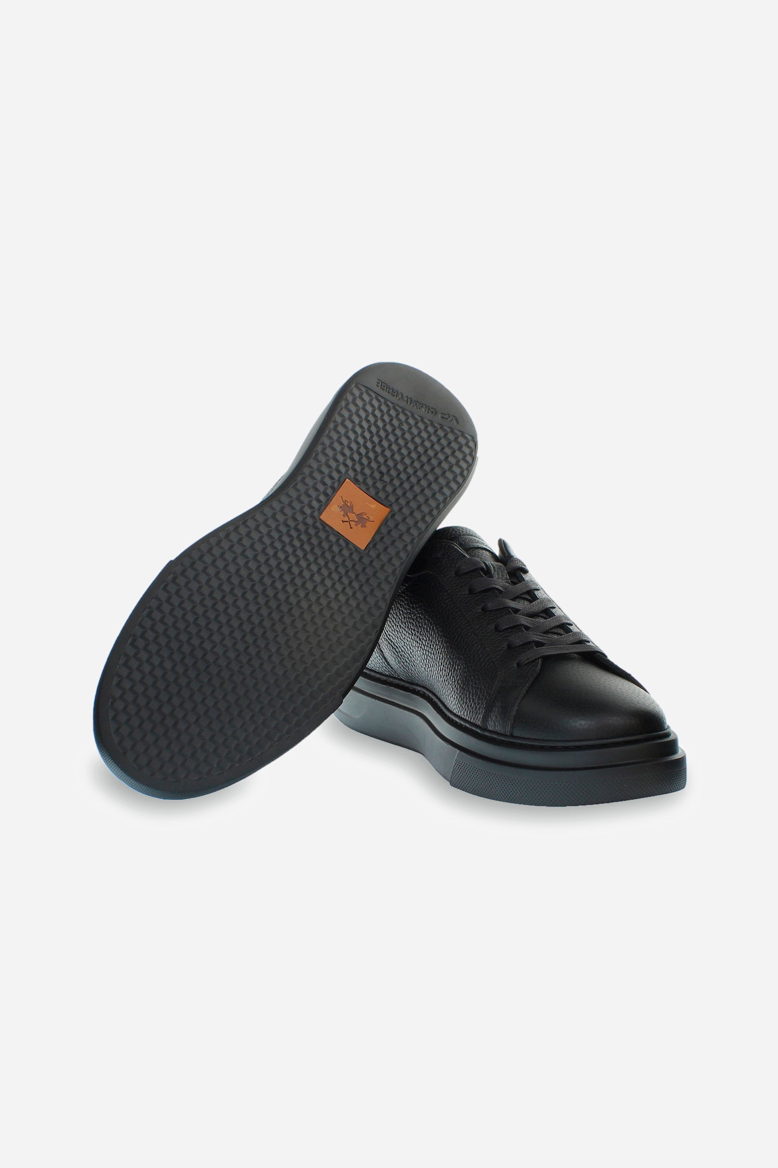 Zapatilla de cuero para hombre