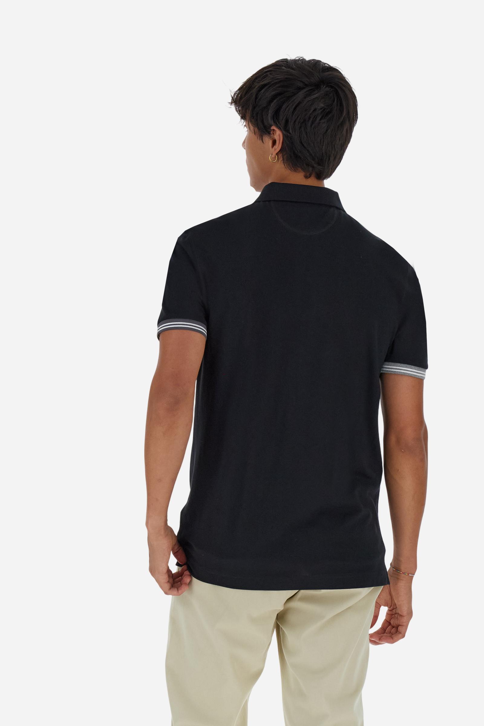 Men’s short-sleeve polo in high-quality stretch cotton piqué, ensuring excellent breathability and flexibility. Classic ribbed collar, two-button placket with customized buttons. Inner collar enriched with contrast tapes and colors for a modern touch. Multicolored ribbed cuffs with different patterns. Small contrast logo embroidered on the chest. Regular fit. Model wears size L. - Black