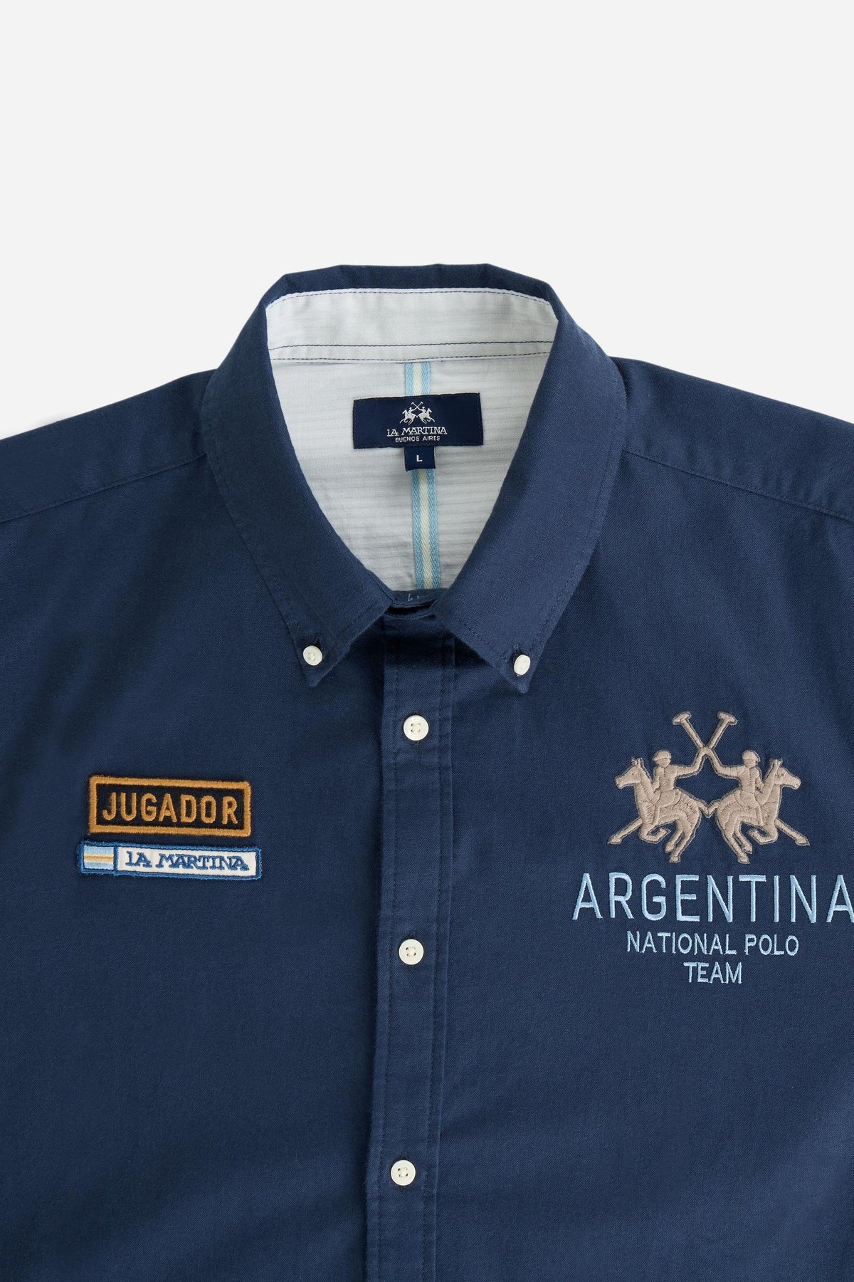 Men’s long-sleeve 100% cotton Oxford shirt with a soft texture, regular tailored fit, button-down collar, mother-of-pearl buttons, and detailed embroidered patches. - Navy