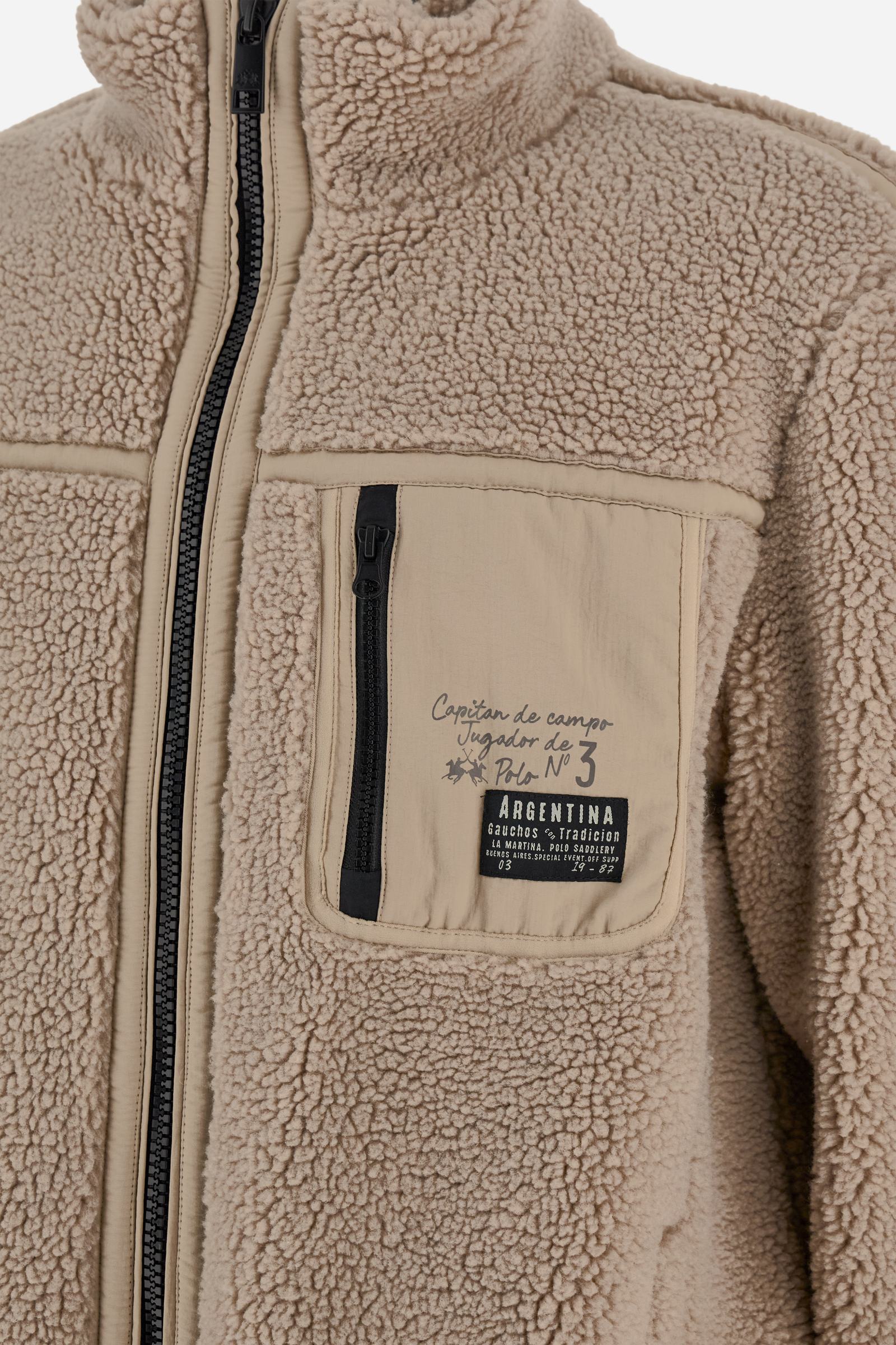 Men’s teddy jacket with high collar and long sleeves. Front zip closure with tone-on-tone details and Jugador de Polo Argentino graphics. - Tidal Foam