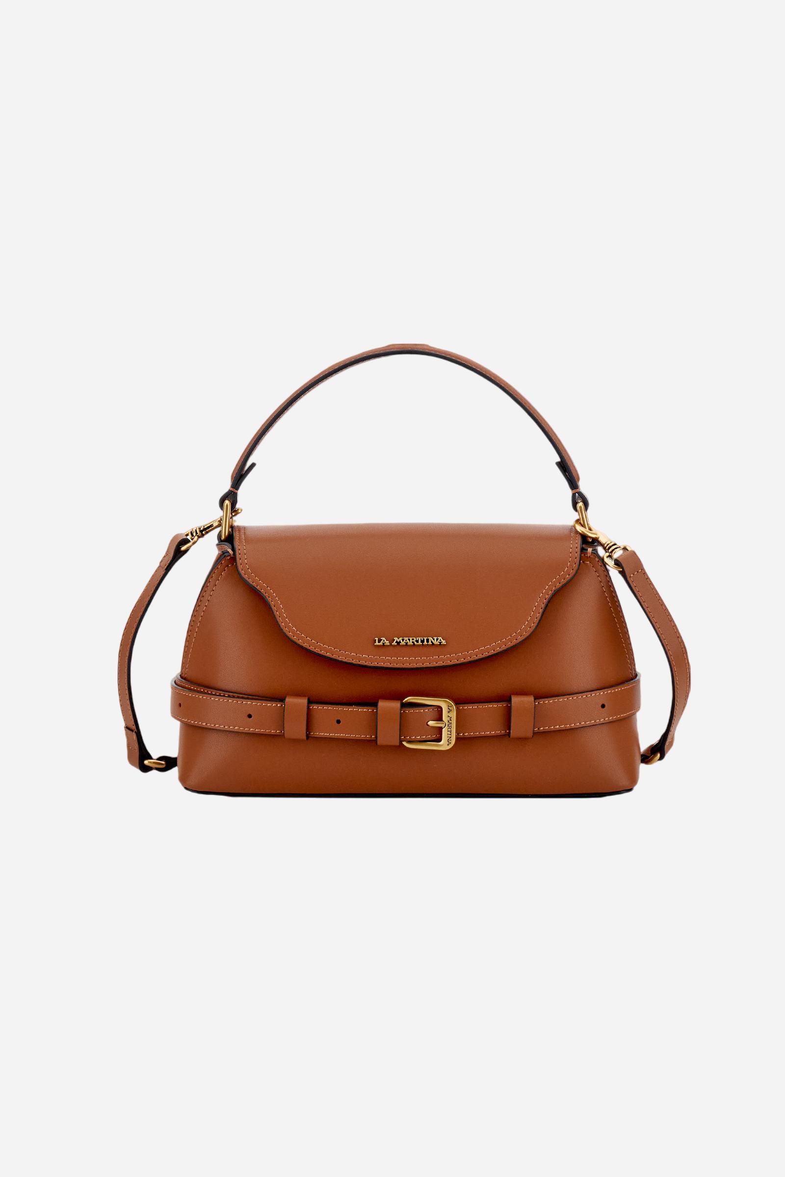 Small trapeze tote bag in calfskin leather. Refined and compact, with flap, rigid handle and removable strap. - COGNAC