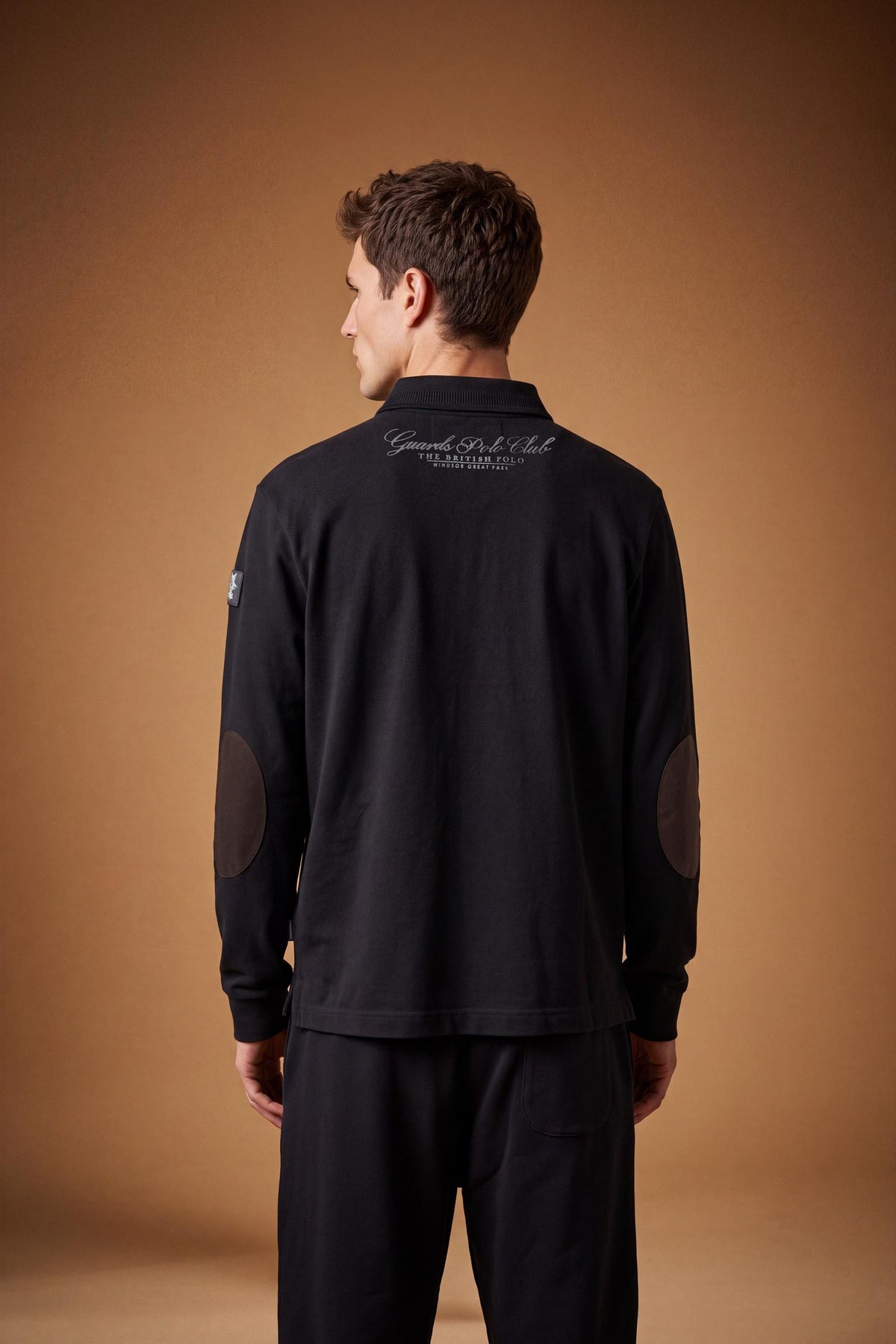 Men's long-sleeve cotton piqué polo with ribbed collar and cuffs, reinforced elbow patches, embroidered details, and a comfortable regular fit for lasting style. - Black
