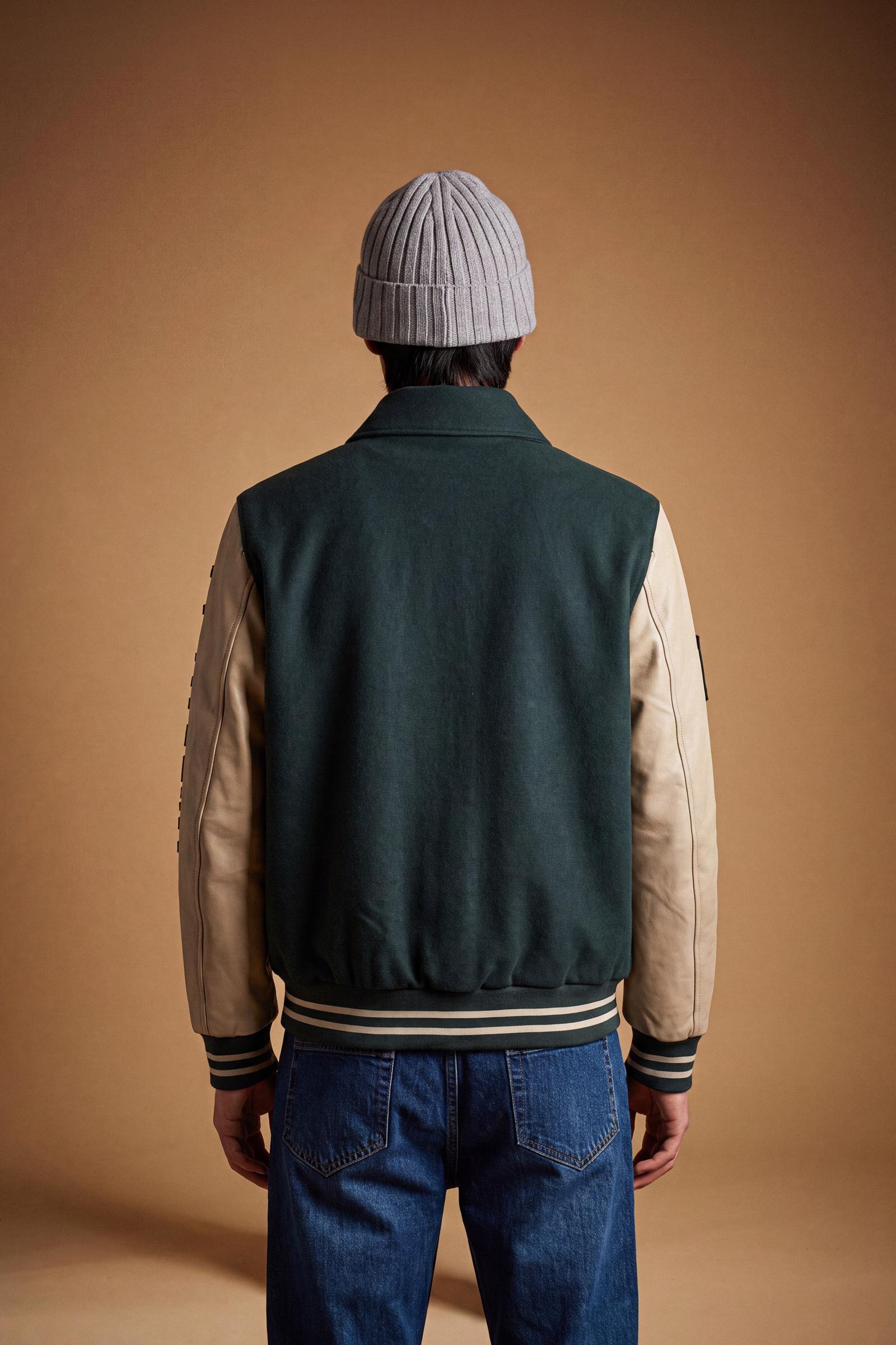 Men's long-sleeve varsity jacket with wool felt body, contrasting faux leather sleeves, ribbed trims, padded lining, chenille patches, and embroidered logo for classic style. - Scarab/Sheer Bliss