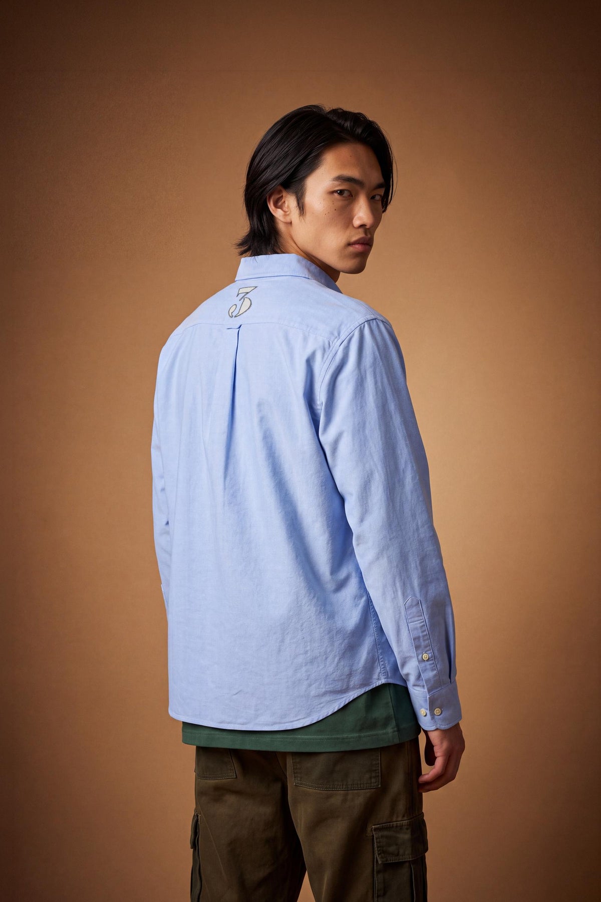 Men's 100% cotton Oxford shirt with a soft feel, regular fit, button-down collar, mother-of-pearl buttons, Polo Match embroidery, and embroidered number 3 patch. - Cornflower blue