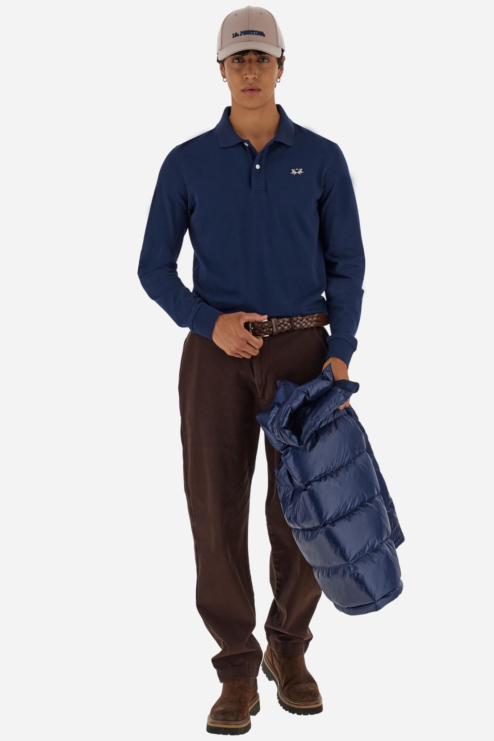 Men’s long-sleeve polo in high-quality stretch cotton piqué for comfort and flexibility. Tone-on-tone ribbed collar with contrast gabardine undercollar embroidered with the brand’s iconic lettering, revealed when the collar is lifted. Contrast embroidered logo on the chest. Slim fit, offering a modern silhouette that enhances the body while ensuring freedom of movement. Model wears size L. - Navy