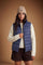 Women's nylon vest with polyamide lining and polyester padding, featuring horizontal quilting, high collar, zip closure, fleece-lined pockets, and adjustable hem for comfort. - Navy Blazer