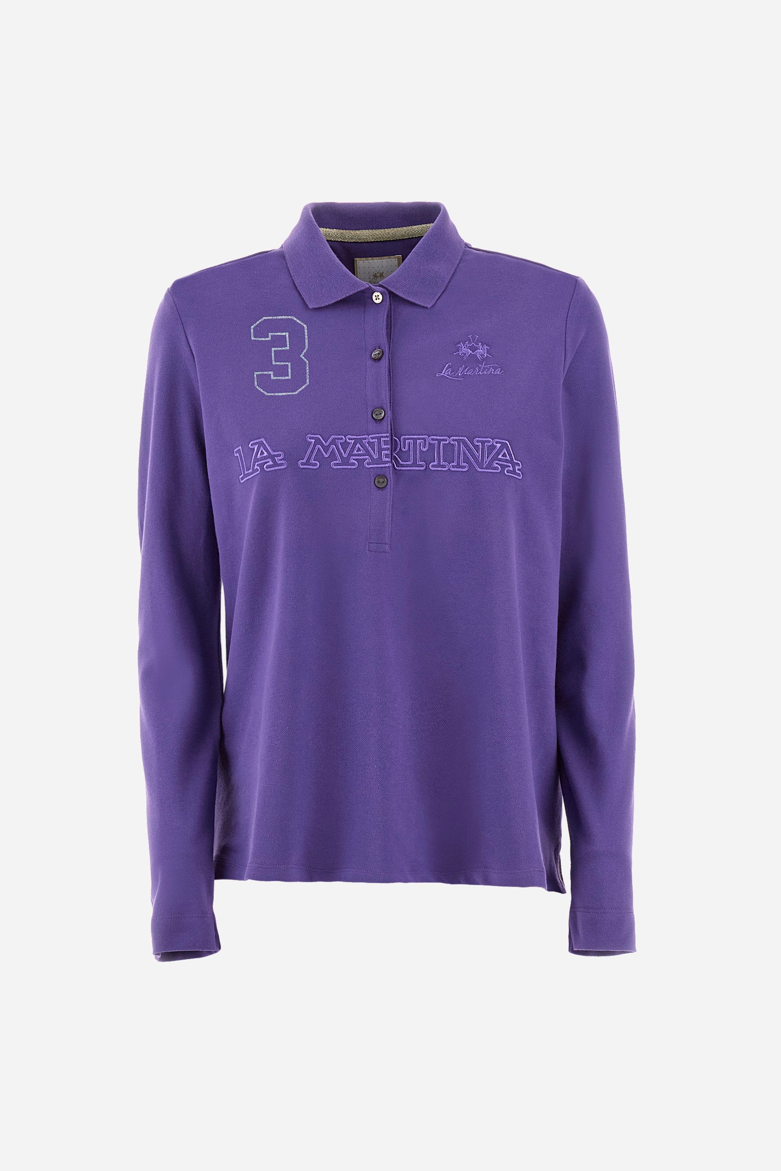 This women's polo shirt from the Timeless line is made of stretch cotton and has a regular fit. Available in a wide range of colours, it is perfect for those looking for a simple but quality garment. The solid colour and the embossed print of the La Martina logo on the front, together with the number 3, make it an elegant and unique garment. The classic 4-button collar completes the ideal look for a casual or sporty outfit. The model is 174 cm tall and wears a size 2. - Tillandsia Purple