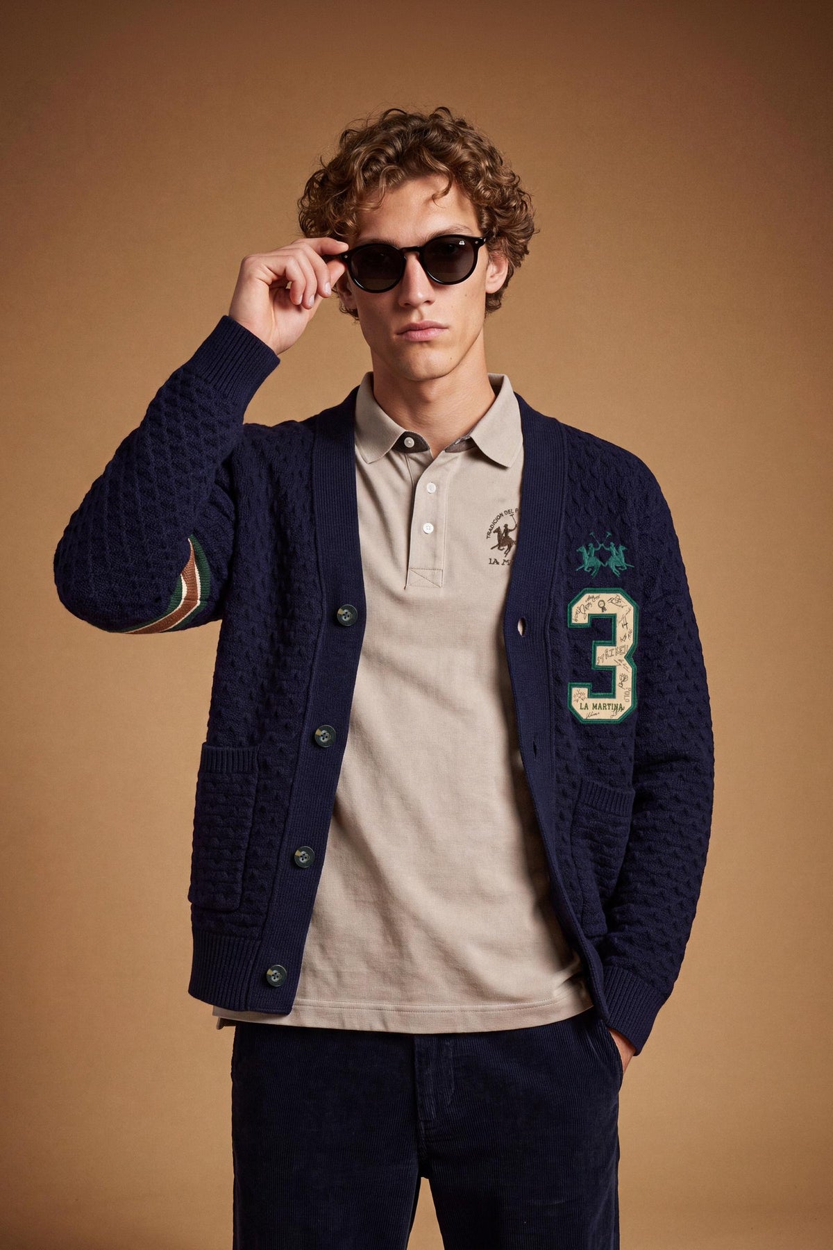 Men's long-sleeve cardigan in 50% lambswool blend with 3D knit, large buttons, patch pockets, bold "3" applique, brand embroidery, and relaxed oversized fit. - Navy