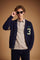 Men's long-sleeve cardigan in 50% lambswool blend with 3D knit, large buttons, patch pockets, bold "3" applique, brand embroidery, and relaxed oversized fit. - Navy