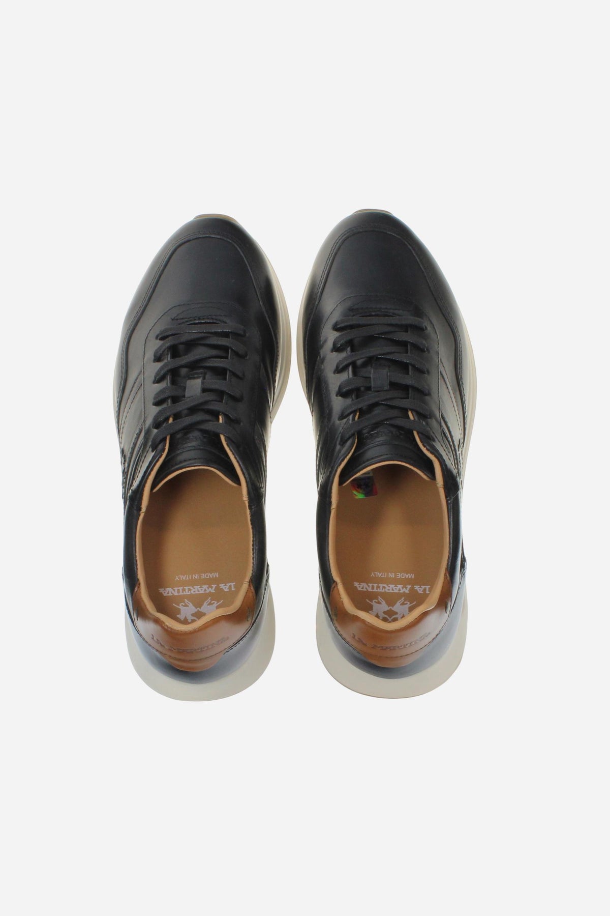 Men's sneaker combining calf and vegetable-tanned leather with artisanal stitching, branded logo, and high-cushioning rubber PU sole for lasting comfort and style. - Black