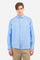 Men's plain long-sleeved shirt made from linen canvas. Button-down collar. Two fabric patches, depicting the brand's certification and the Argentine flag, are sewn on the hem of the garment. A tone-on-tone logo is embroidered on the left side of the chest. Regular fit. The model is wearing a size L. - Vista Blue