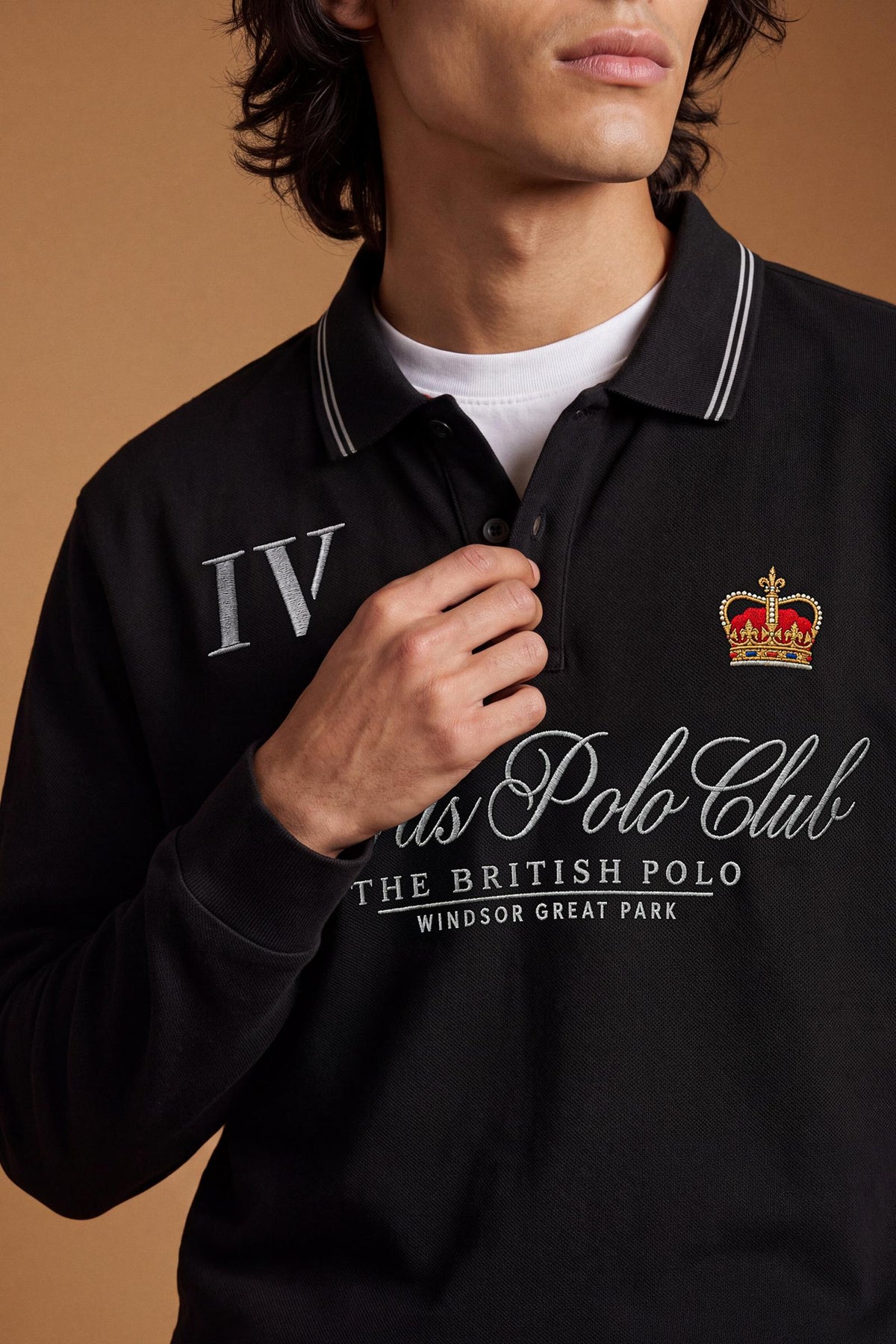 Men's long-sleeve cotton piqué polo with a regular fit, ribbed collar and cuffs, contrasting details, and multicolored embroidered logos for a refined look. - Black