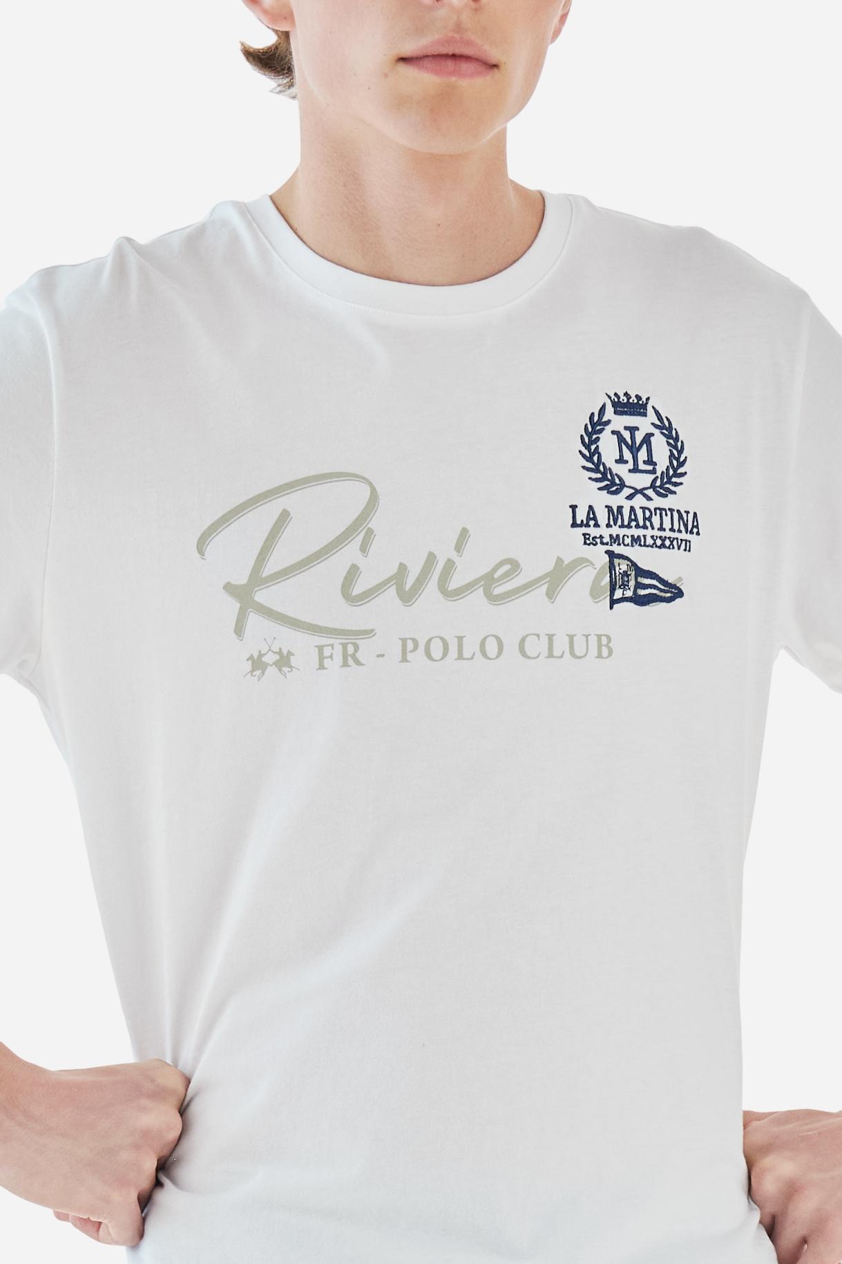 Men's solid color T-shirt, made of cotton jersey. Crew neck. The front features printed text as well as symbols and text created using embroidery techniques. The La Martina lettering is embroidered on the left chest. The fit is regular. The model is wearing size L. - Optic White