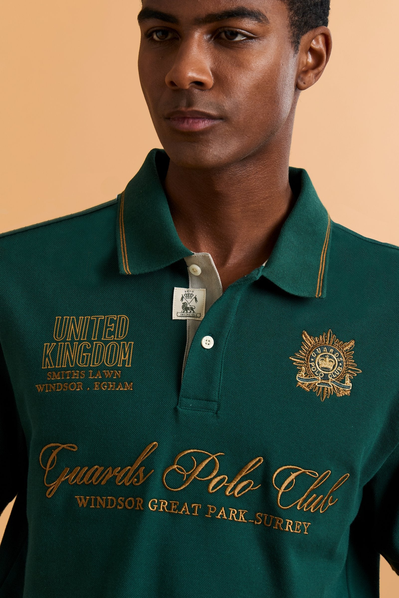 Men’s short-sleeve piqué polo. Contemporary fit with ribbed details on collar and cuffs, enriched with lettering graphics and crests inspired by the Guards Polo Club. - Pineneedle                                                                                                                                                                                                                                                                                                                                             