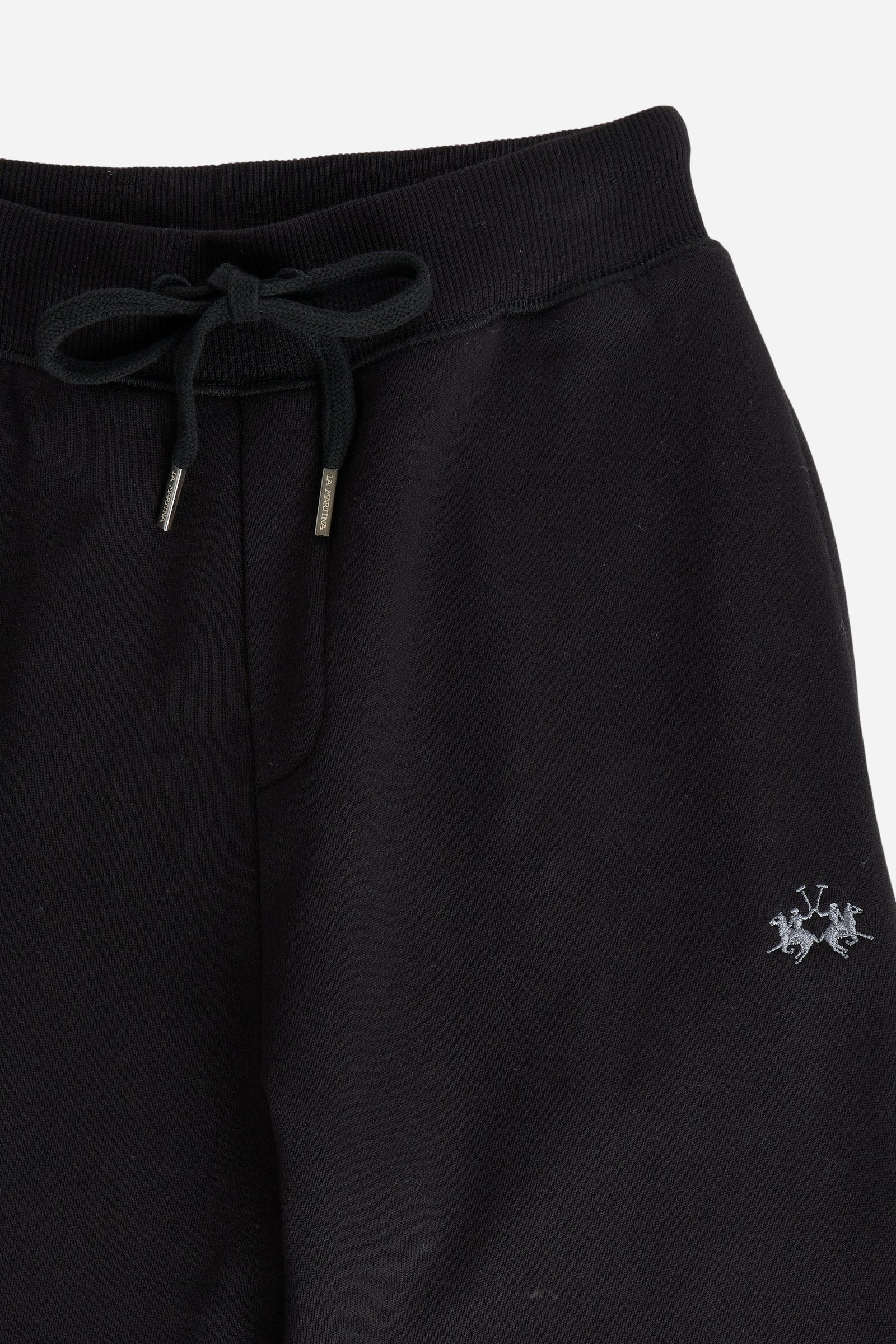 Women's pants in soft brushed cotton with an elastic waistband, adjustable drawstring, vertical side pockets, and a relaxed wide-leg fit for all-day comfort. - Black