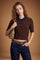 Slim-fit women's short-sleeve polo made from soft lambswool blend with vertical ribbing, ribbed collar, cuffs, and hem, featuring contrasting trims and a three-button front. - Dark Brown