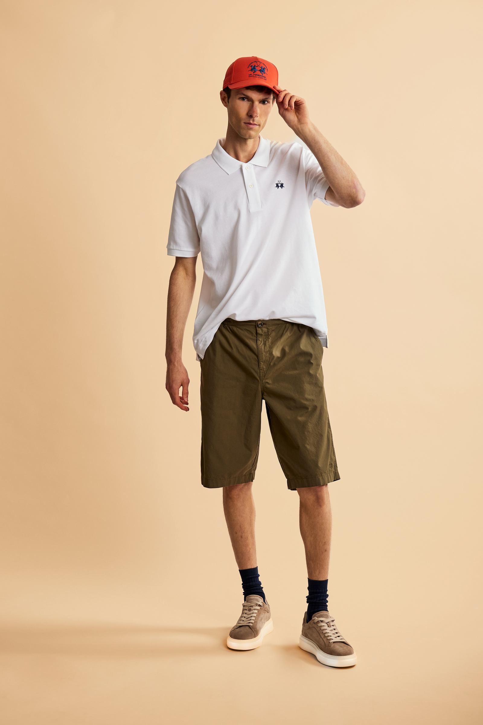 Men’s short sleeve cotton piqué polo shirt with regular fit, two-button placket and contrast brand logo. - Optic White