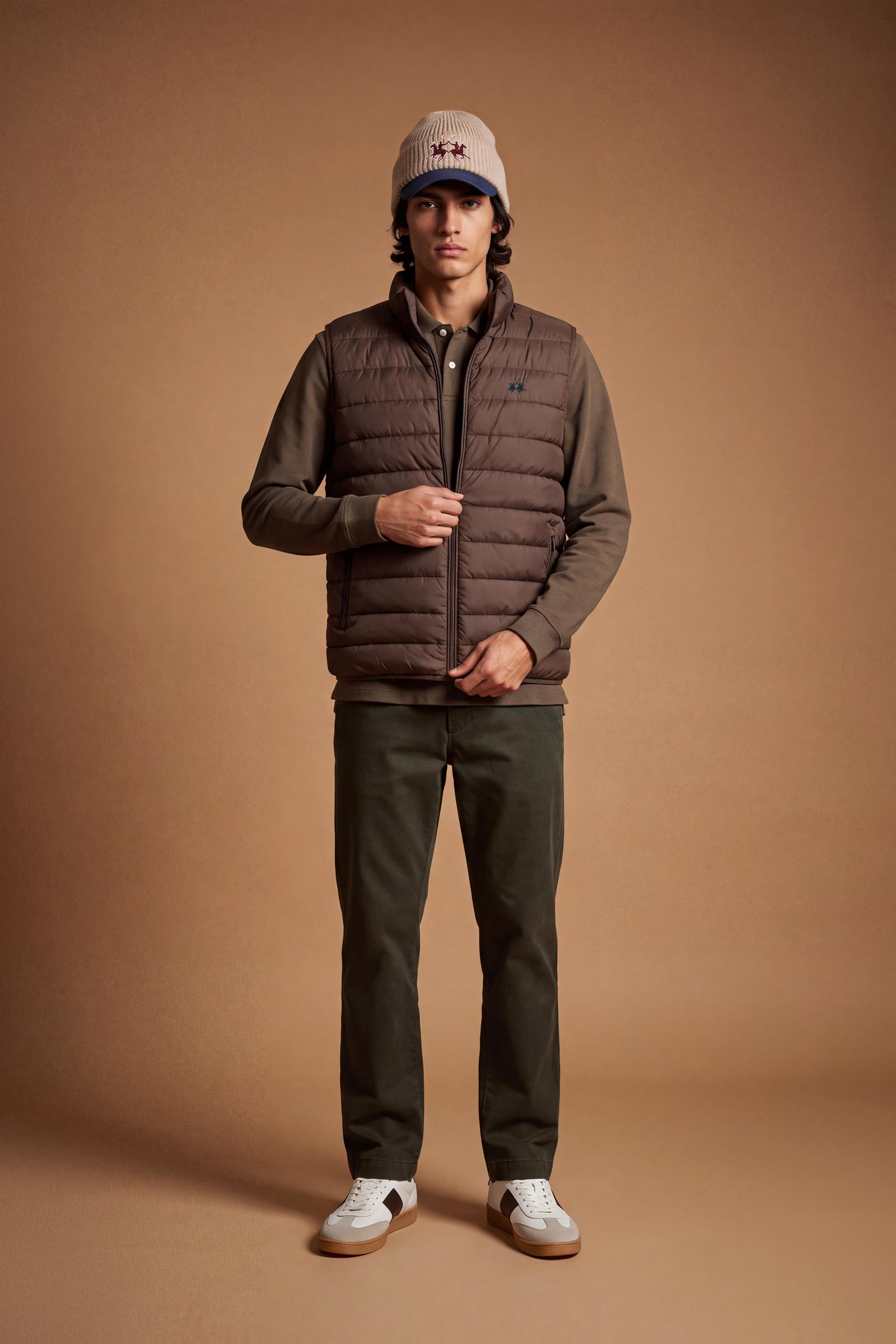 Men's sleeveless down jacket in lightweight nylon with wadding padding for warmth, zippered pockets, high collar, and contrasting interior and logo details. - Hot Fudge