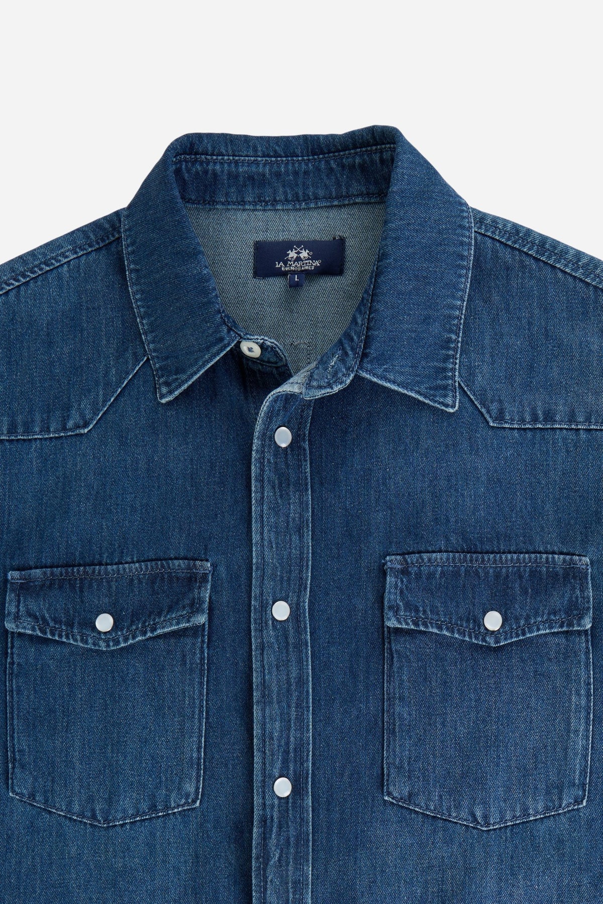 Men’s long-sleeve denim shirt in lightweight 100% cotton with deep blue wash, snap button details, chest pockets, and a clean, comfortable fit. - Dark Indigo Denim