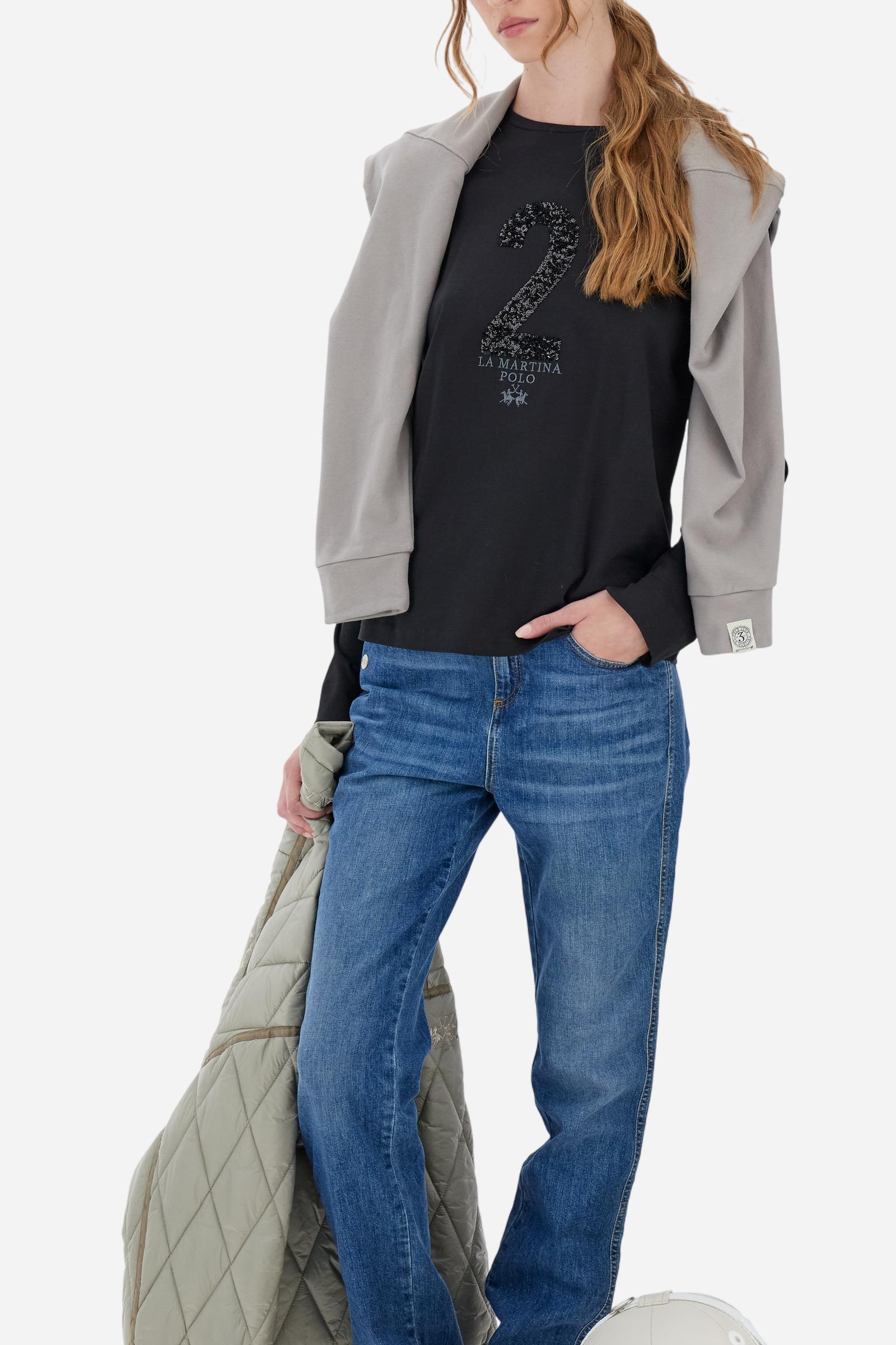 Women’s long-sleeve crew-neck T-shirt in 100% cotton jersey. The smooth, fluid fabric feels silky on the skin. On the chest, a large sequin patch number is paired with brand-identifying embroidered lettering, while a small logo is embroidered underneath. Regular fit for a versatile piece that combines simplicity with subtle glamour. Model wears size 2. - Black