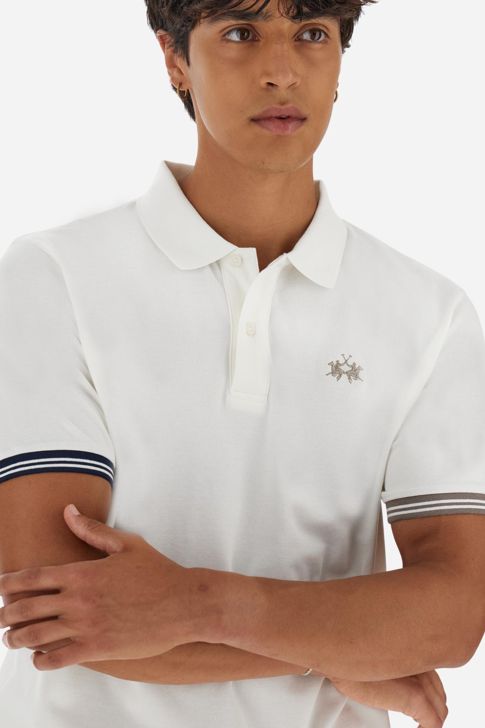 Men’s short-sleeve polo in high-quality stretch cotton piqué, ensuring excellent breathability and flexibility. Classic ribbed collar, two-button placket with customized buttons. Inner collar enriched with contrast tapes and colors for a modern touch. Multicolored ribbed cuffs with different patterns. Small contrast logo embroidered on the chest. Regular fit. Model wears size L. - Off White