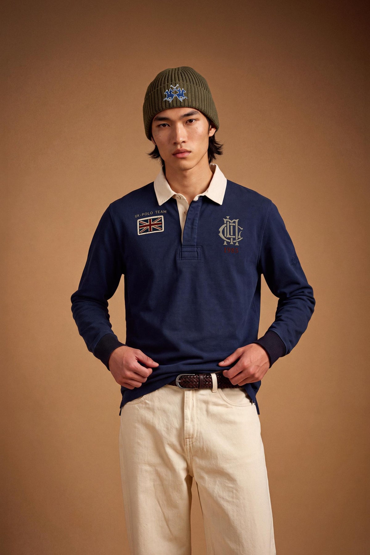 Men’s long-sleeve polo in heavy pure cotton jersey with textured fabric, hidden placket, ribbed cuffs, and heritage British polo graphic for a classic, clean fit. - Navy Blazer