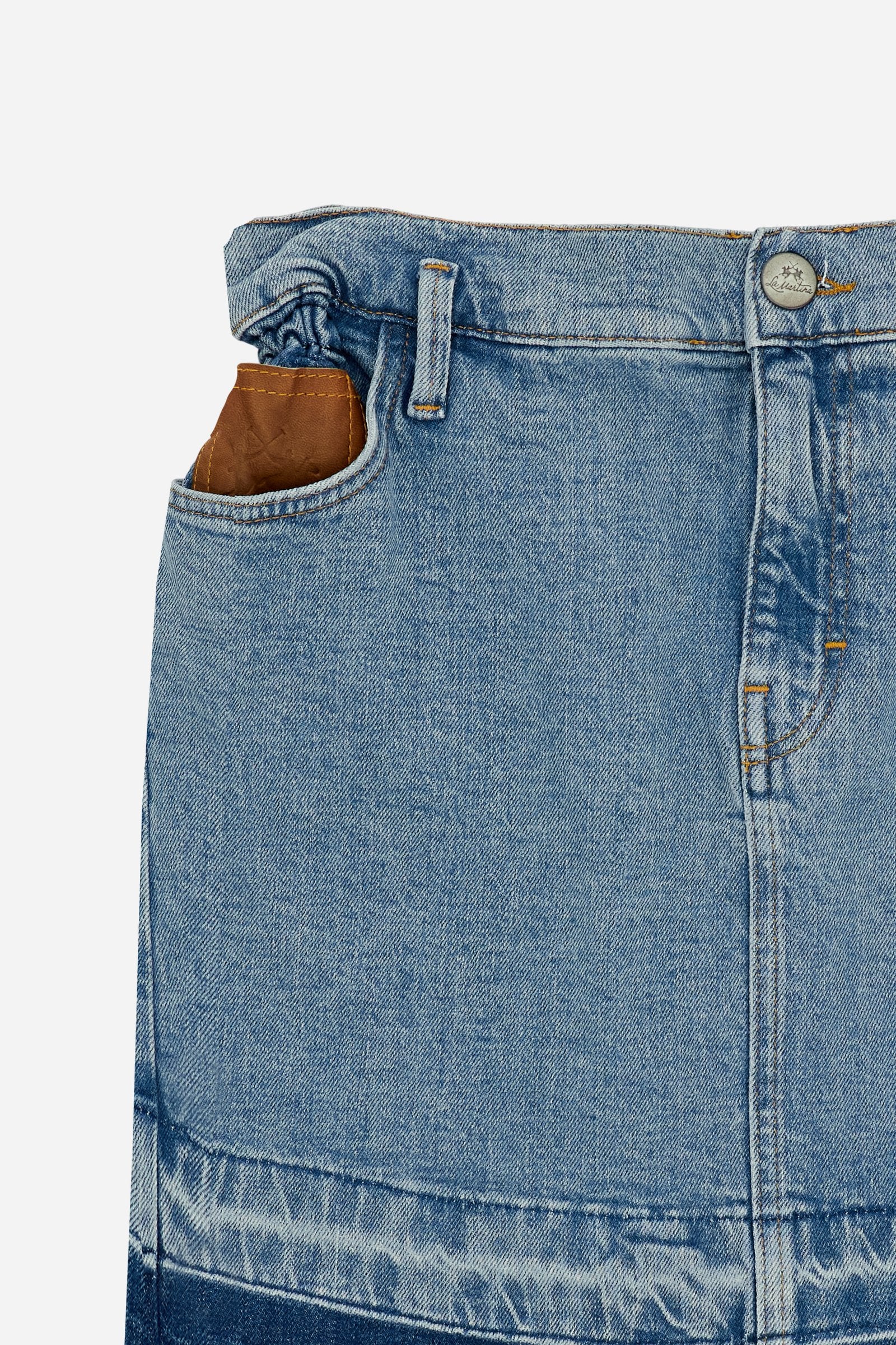 Denim mini skirt with light-medium wash and worn-in effect. Slightly flared five-pocket style with raw-cut hem and contrast pocket with logo. - Medium Indigo Denim