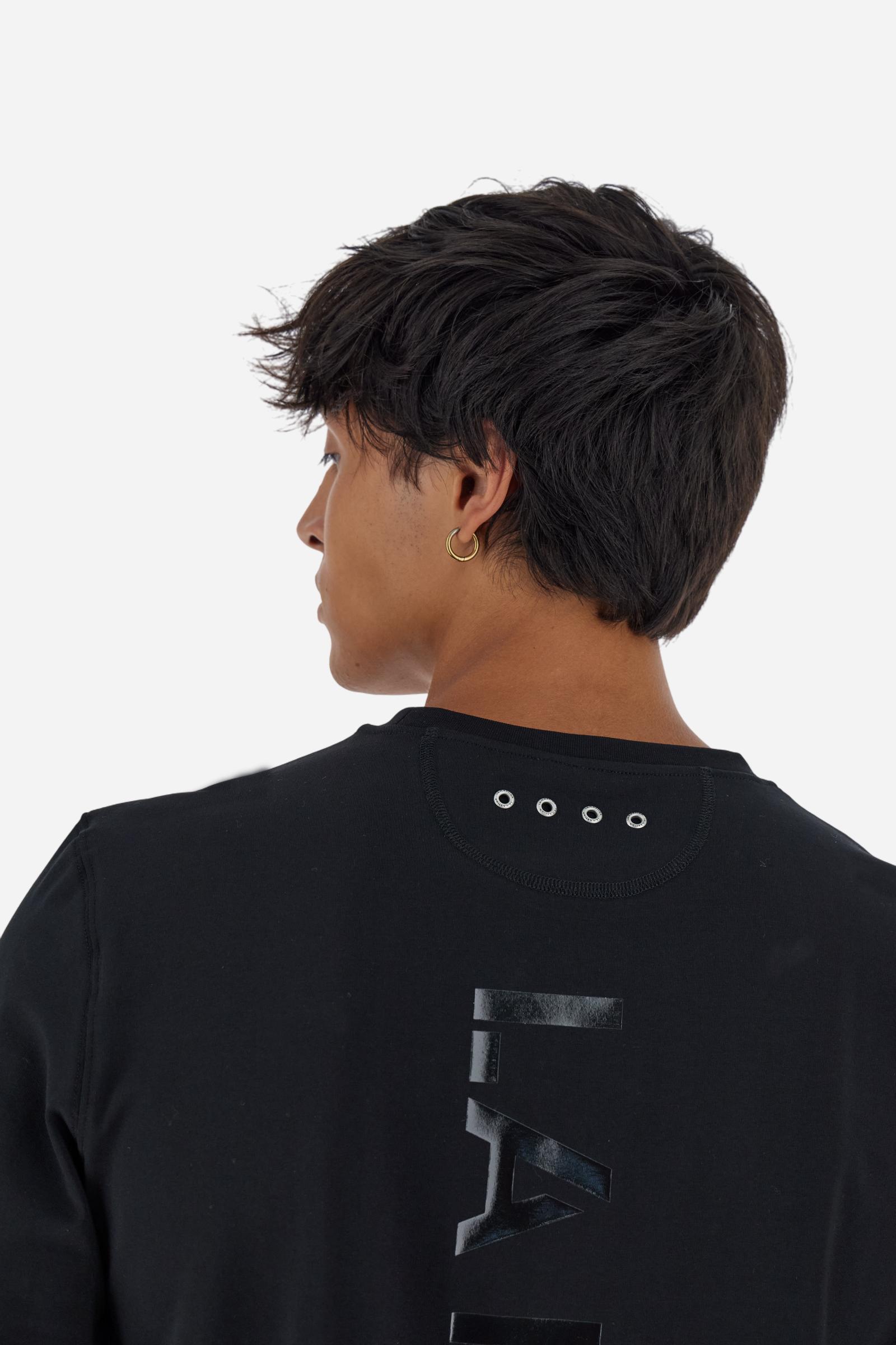 Crew-neck long-sleeve T-shirt made of 100% high-quality cotton jersey. The smooth, fluid fabric has a technical look that ensures comfort and style. A small translucent transfer logo is applied on the chest, while two Asociacion Argentina de Polo (AAP) transfers decorate the right sleeve. The large vertical translucent print on the back is a signature detail of the brand. Regular fit with clean lines and refined finishes for a simple yet distinctive piece. Model wears size L. - Black