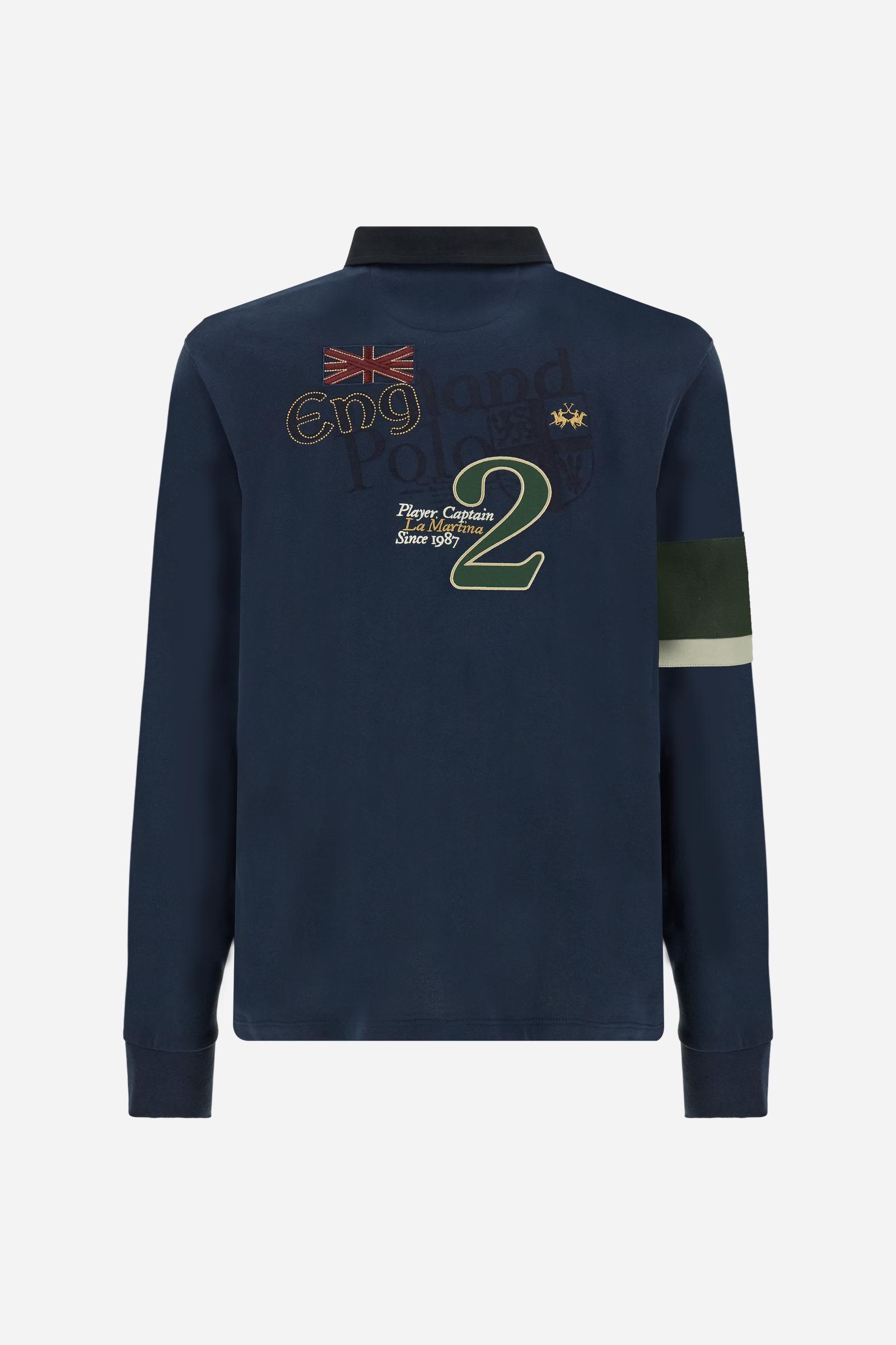 Long-sleeve polo shirt in 100% cotton jersey, soft and warm to the touch. Gabardine collar in tone with a contrast placket for a modern look. The English flag is printed under the raised right collar tip. Contrasting fabric bands and a patch with number 2 decorate the right sleeve, evoking polo player uniforms. Multicolor graphics dedicated to the English team and past special events enrich the design, with a large team logo embroidered in two-tone on the chest. Regular fit. Model wears size L. - Navy