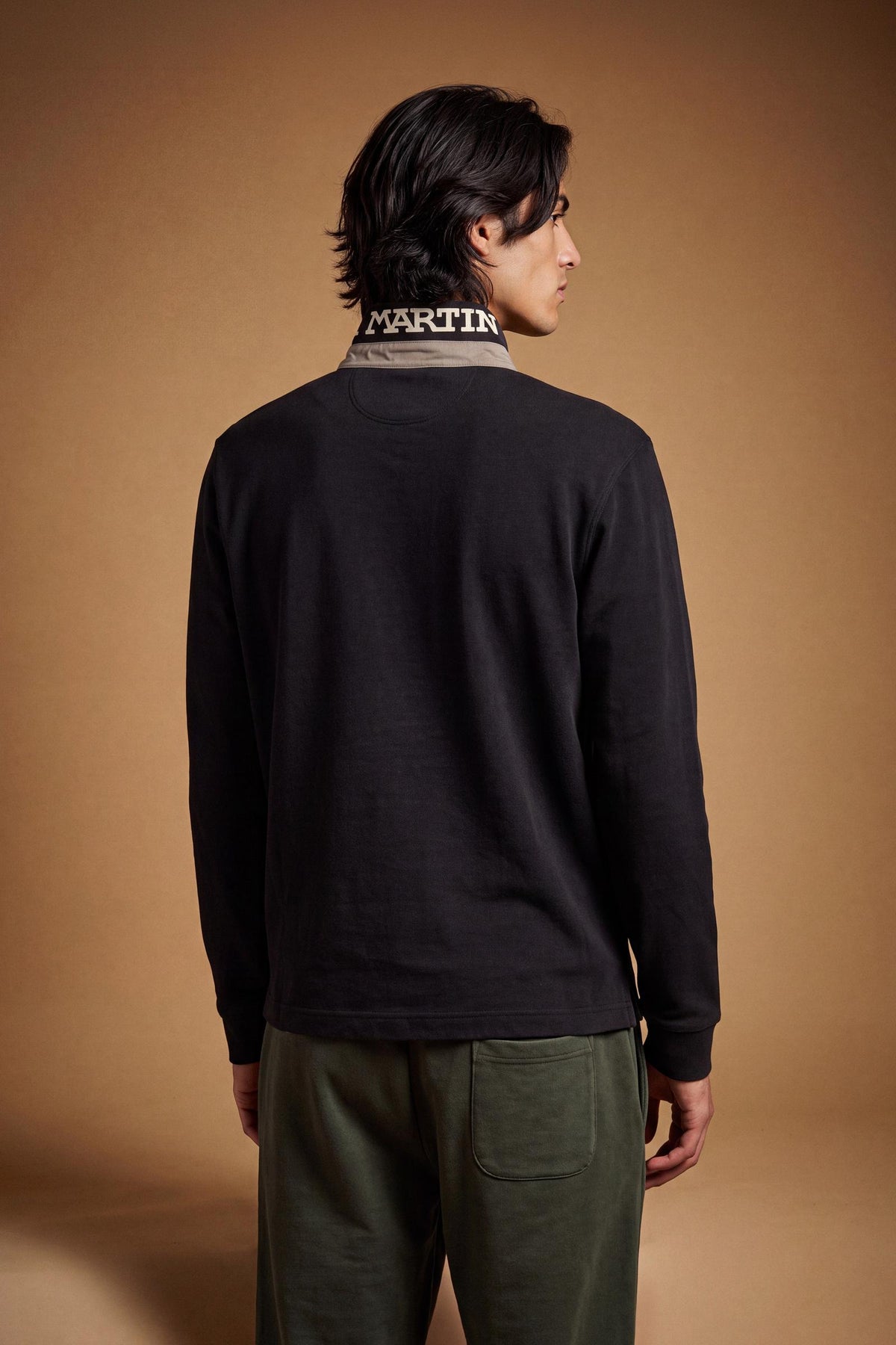 Men's long-sleeve polo in soft cotton jersey with contrasting gabardine collar, ribbed details, multicolor striped placket, and embroidered team logo for comfor - Black