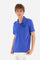 Men's plain short-sleeved polo shirt made from stretch piqué. Featuring a two-button fastening and a ribbon on the inside collar in contrasting coloured grosgrain. The collar and cuffs are in matching rib knit, with the undercollar also in rib knit but in a contrasting colour. The large logo is embroidered on the chest, left side with contrasting coloured thread. The undercollar features a print of the La Martina lettering in a contrasting colour. Regular fit. The model is wearing a size L. - Dazzling Blue