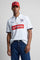 Numbered style with exclusive label, produced in only 100 pieces per style/colour. The label is positioned on the back, at the lower right, with the progressive number clearly visible. Short-sleeved polo shirt made from solid-colour 100% cotton jersey. The contemporary-cut design features a modern, wide and relaxed silhouette, with a current streetwear aesthetic. The style is completed with a tone-on-tone ribbed collar and contrast ribbed cuffs. The front fastening has two buttons. The front graphic is bold
