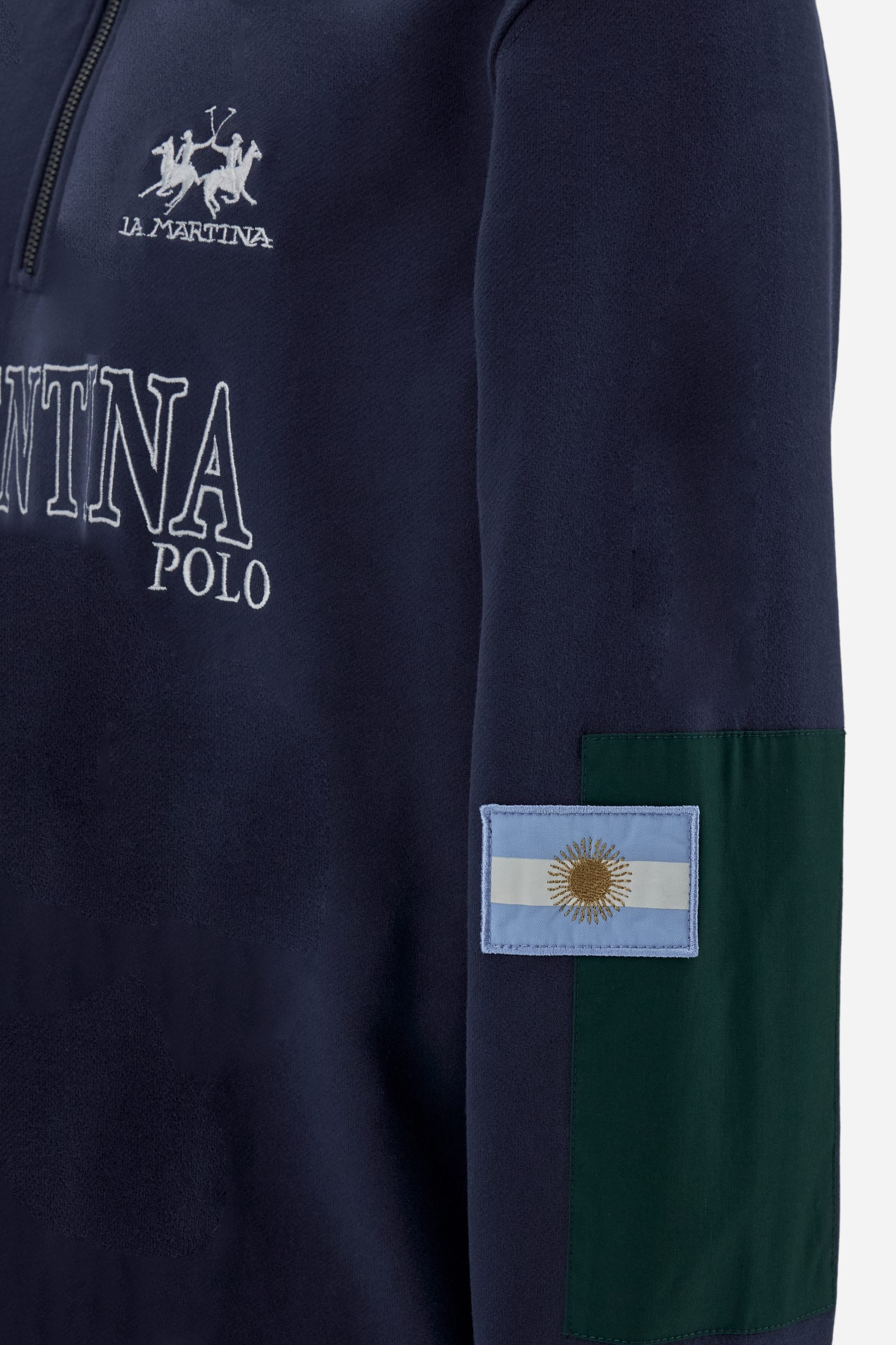 Men's long-sleeved solid colour sweatshirt in cotton. Made of pure cotton fabric with a soft, velvety touch. Practical half-zip opening and ribbed cuffs and collar details. Vivid multi-coloured with Argentina-inspired graphics on the chest and sleeves. The logo is embroidered on the left side of chest for a subtle touch of branding. The fit is regular to suit everyday wear. The model is wearing a size L. - Navy