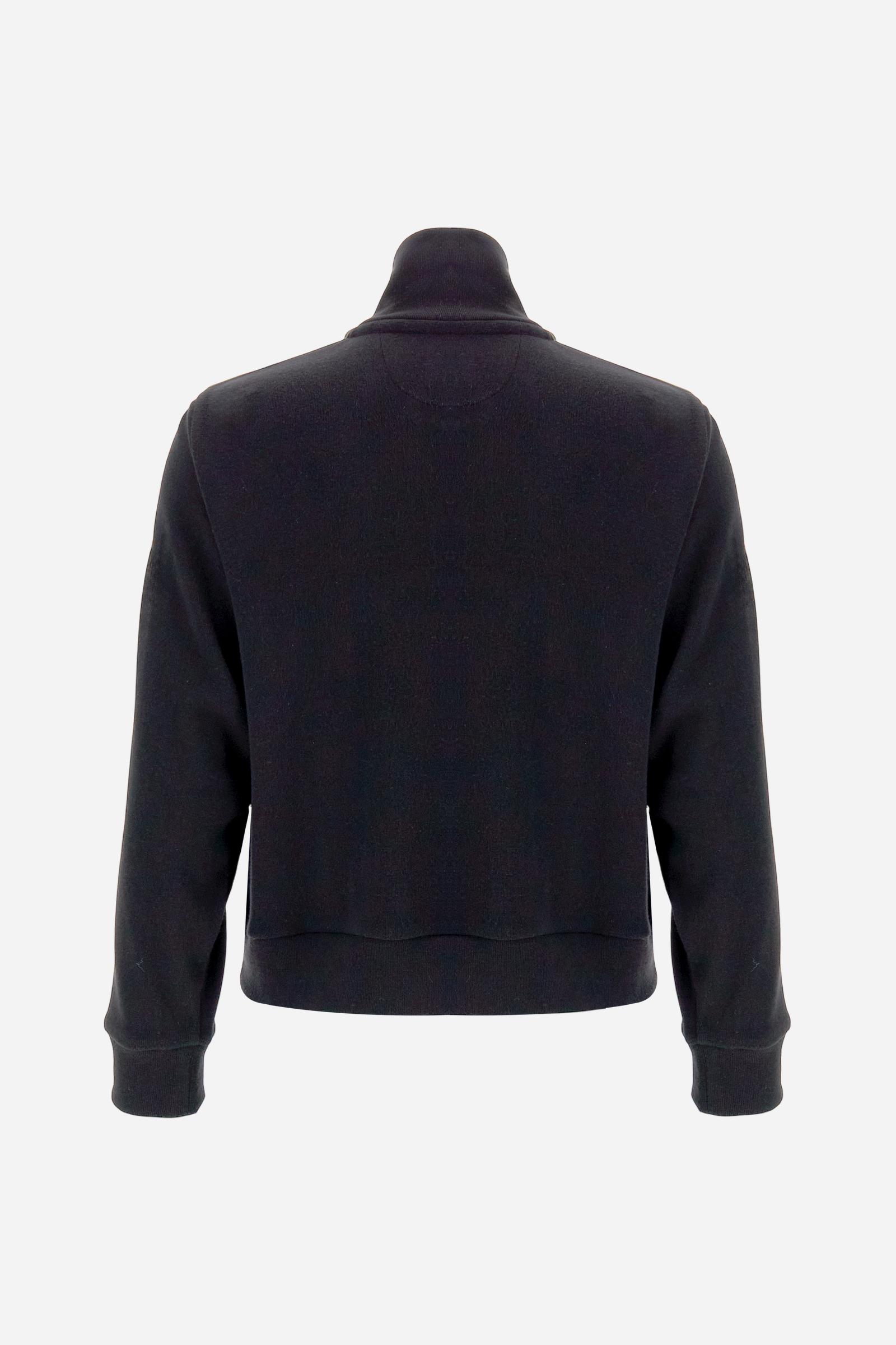 Women’s full-zip sweatshirt with long sleeves in soft interlock viscose blend, offering a luxurious feel on the skin. Straight cut with fluid line and sport-luxury details. Striped bands on the sleeves and heraldic embroidery on the chest add a contemporary touch. The model wears size 2. - Black
