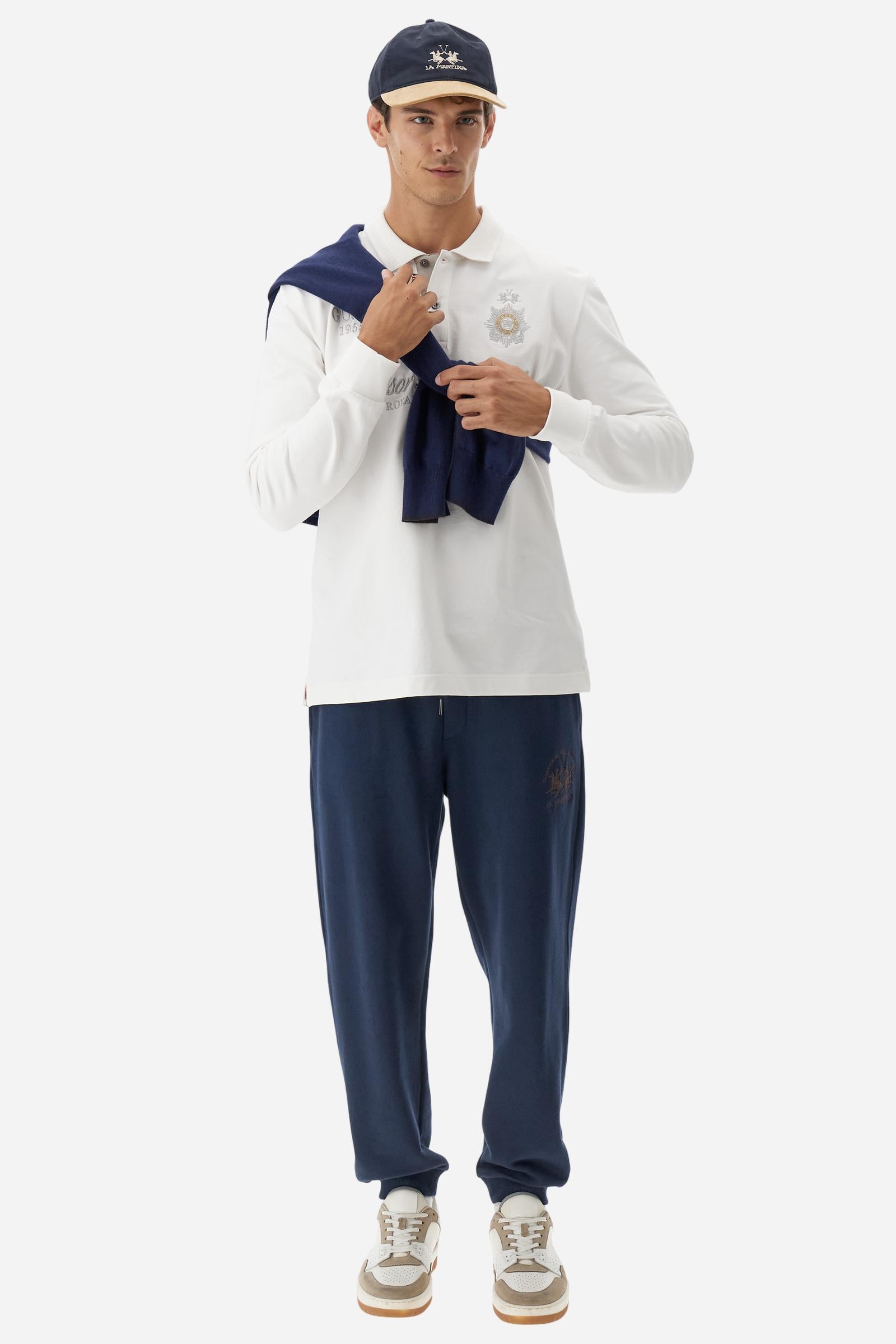 Long-sleeve polo shirt in warm cotton jersey. Ribbed collar with subtle textured detail, contrast undercollar and placket. Logo and Guards crest embroidered in contrast on the chest, paired with raised embroidered lettering inspired by Windsor tradition and British polo. Regular fit for an elegant yet relaxed style. Model wears size L. - Off White