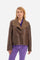 This women's solid-coloured leather-effect short jacket is made of polyester and features long sleeves and a regular fit with buttons. The fur effect on the open collar adds a touch of style, while the double pockets and visible stitching emphasise the modern design. The logo applied to the pocket completes the look. This jacket from the Argentina line is ideal for those looking for a versatile and resistant garment for outdoor activities. The model is 174 cm tall and wears a size 2. - Puce