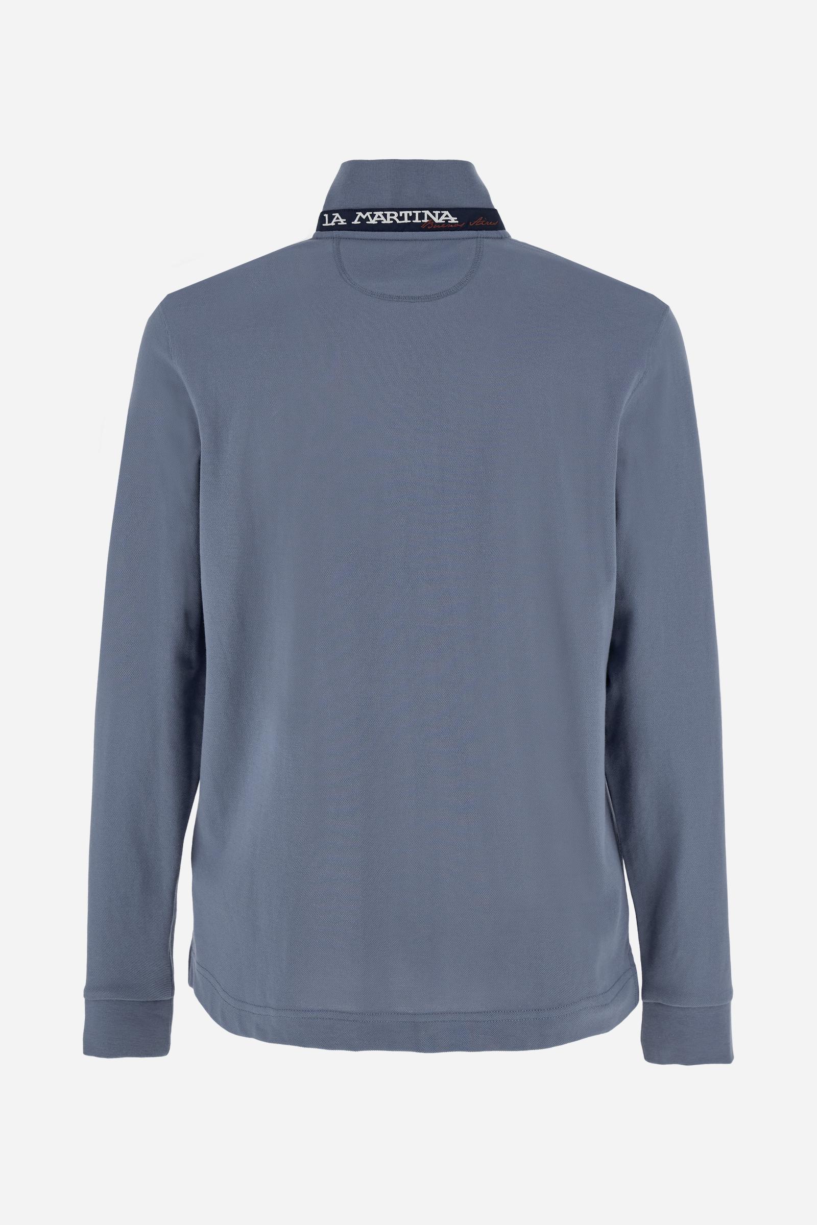 Men’s long-sleeve polo in high-quality stretch cotton piqué for comfort and flexibility. Tone-on-tone ribbed collar with contrast gabardine undercollar embroidered with the brand’s iconic lettering, revealed when the collar is lifted. Contrast embroidered logo on the chest. Slim fit, offering a modern silhouette that enhances the body while ensuring freedom of movement. Model wears size L. - Flint Stone