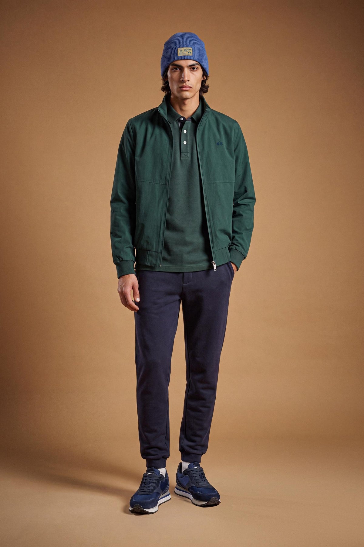 Men's padded jacket in cotton-polyamide blend for comfort and durability. Features high collar, zip closures, elastic ribbed trims, and polyester quilted lining - Pine Grove