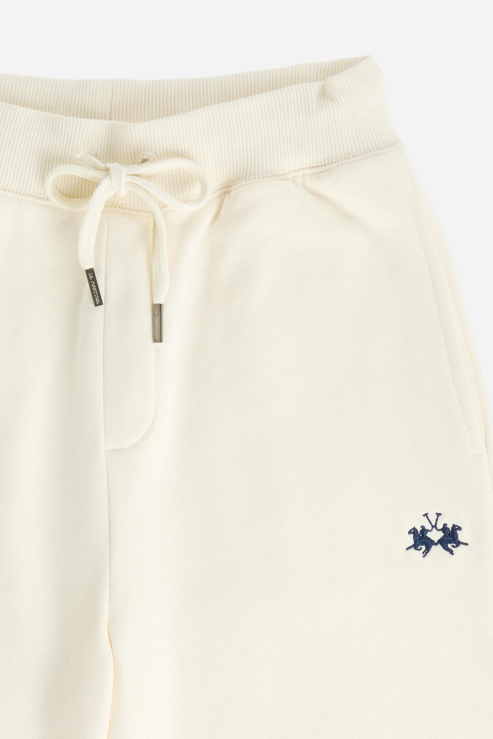 Women's pants in soft brushed cotton with an elastic waistband, adjustable drawstring, vertical side pockets, and a relaxed wide-leg fit for all-day comfort. - Pristine